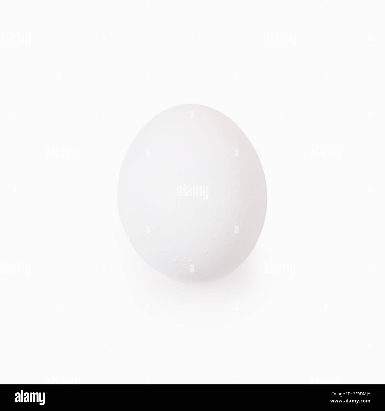 One Easter egg white on a white background. Isolated Stock Photo - Alamy
