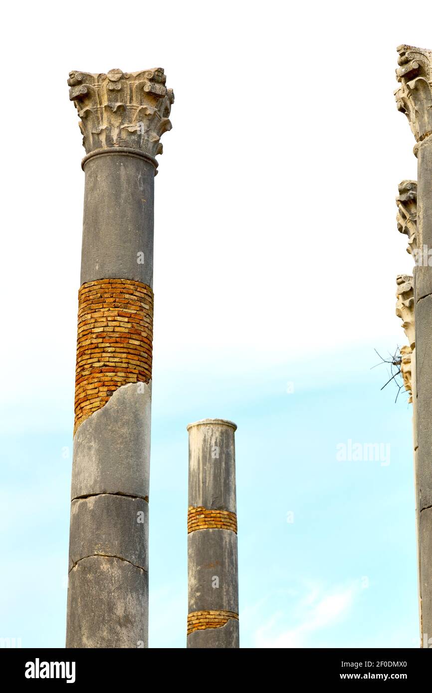 Old column in the africa sky history and nature Stock Photo - Alamy