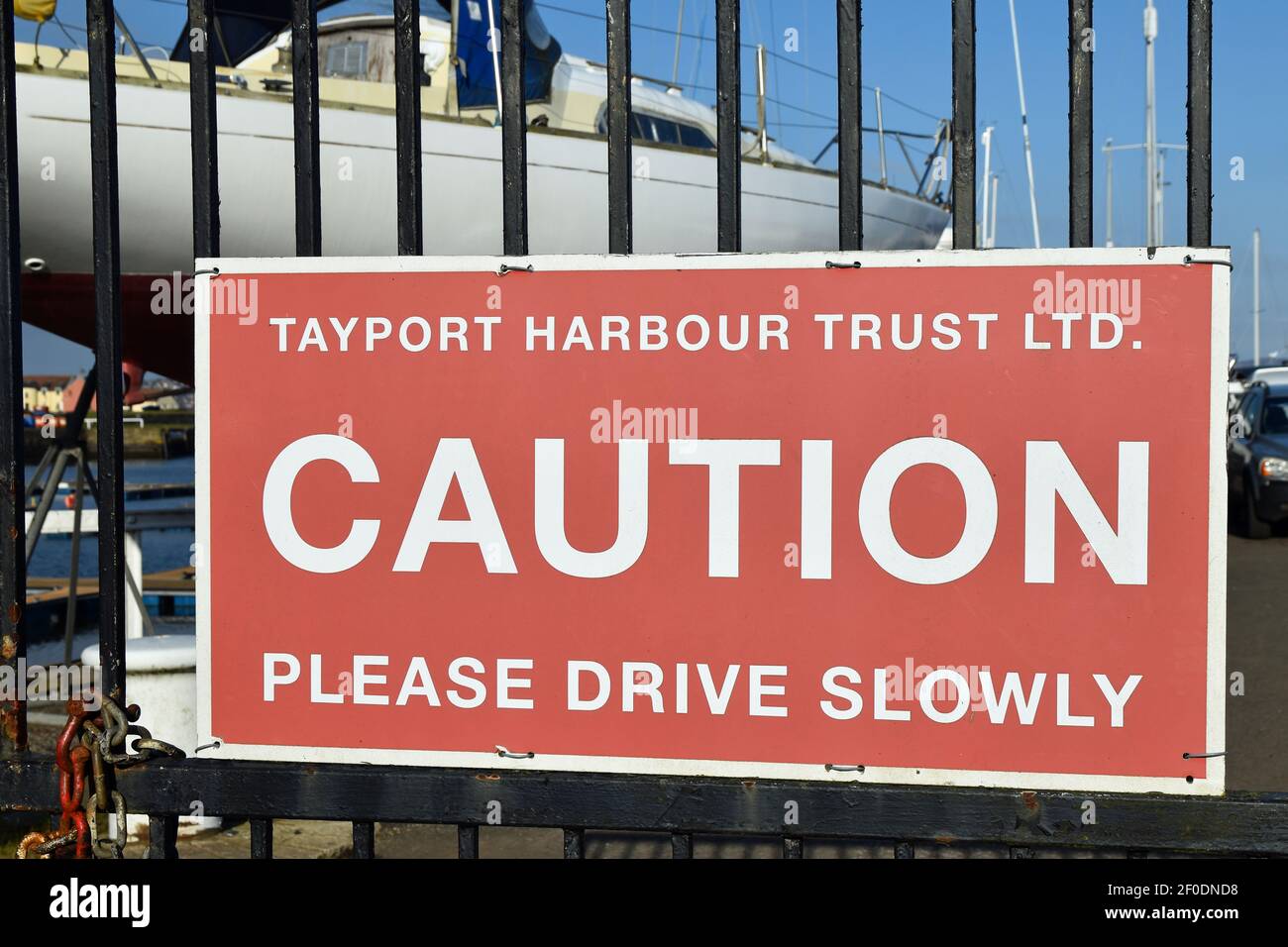 Tayport Harbour Trust sign Caution Please Drive Slowly Stock Photo Alamy