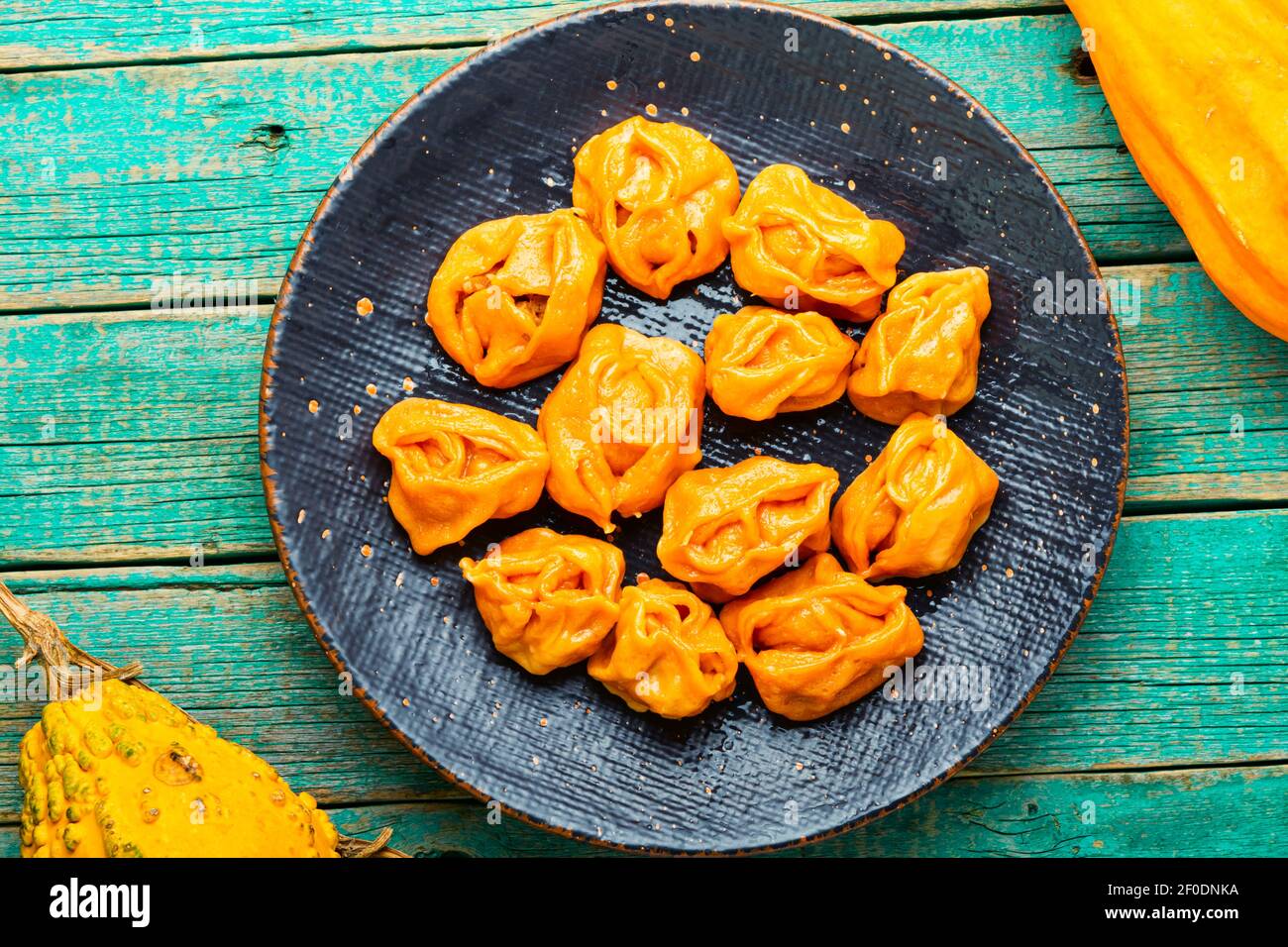 Steamed dumplings or manti with pumpkin.Kazakh manti with pumpkin Stock