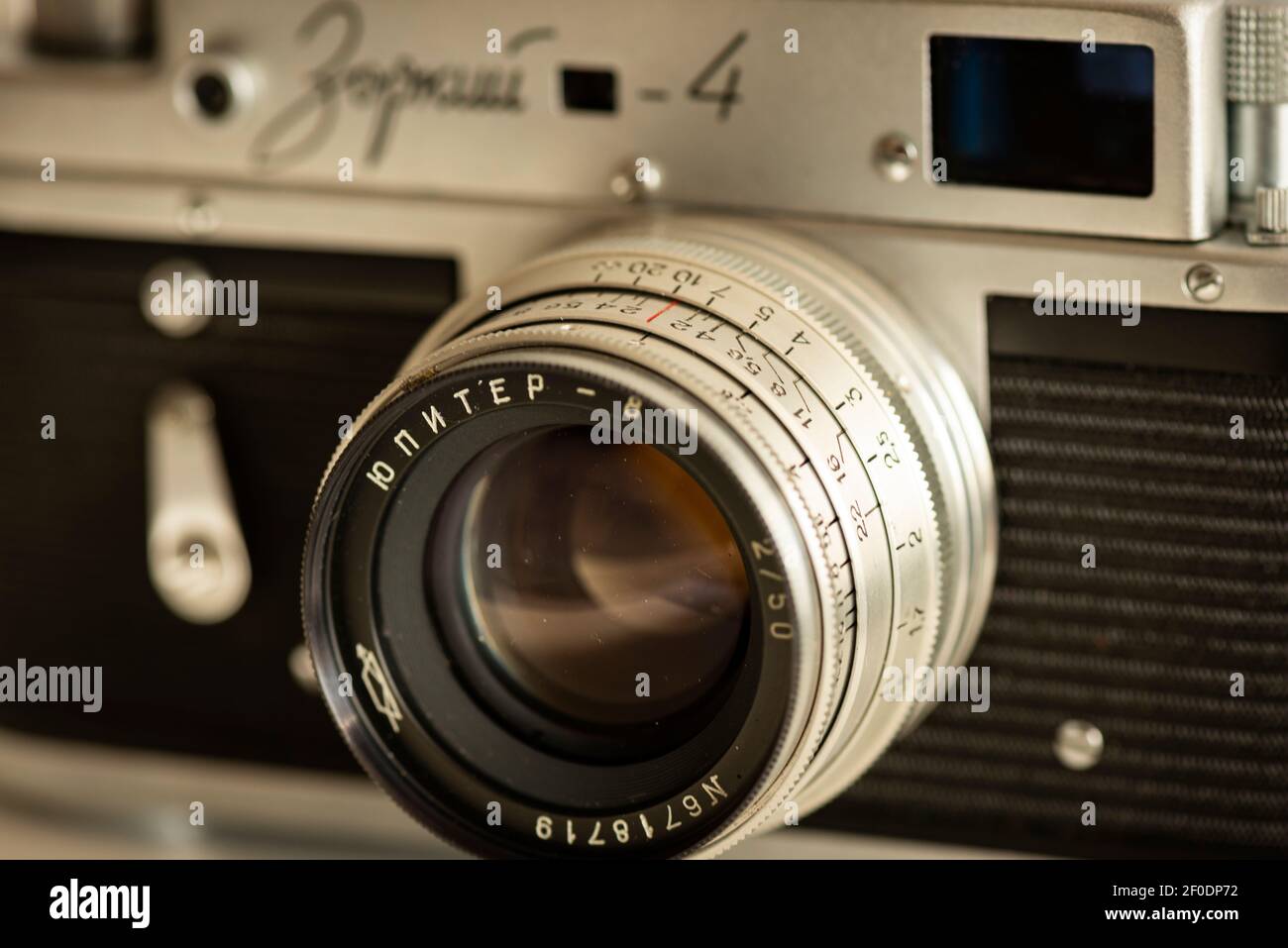 Jupiter 2/50 manual focus lens front view of Russian Zorki 4 old vintage silver manual film camera as classic retro photography concept. Stock Photo