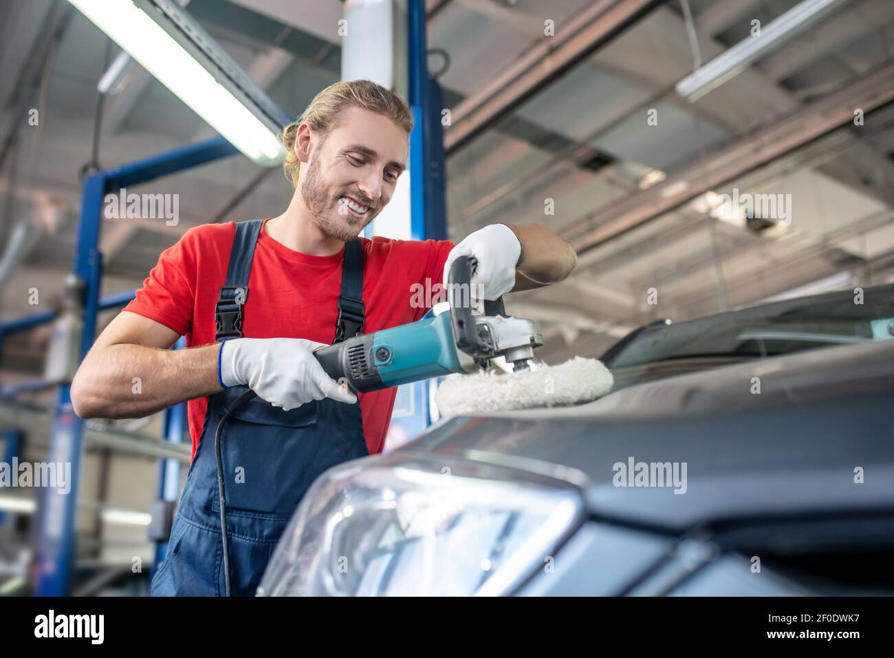 Man who improves appearance of car body Stock Photo