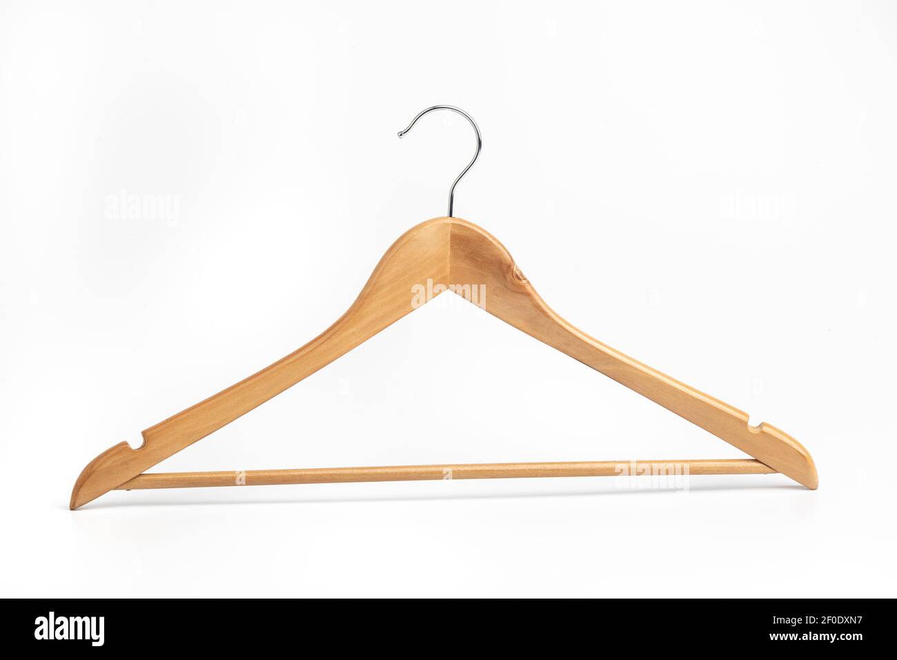 A wooden coat and trouser hanger. Stock Photo