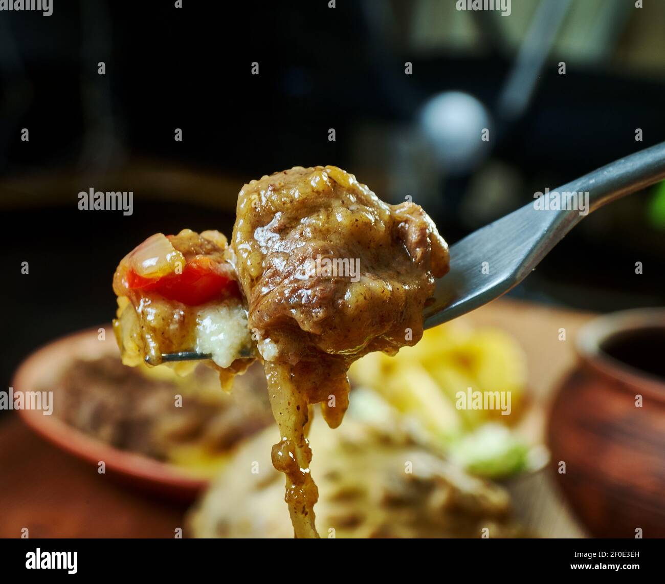 New Orleans Grillades Louisiana or breakfast dish made with steaks, grits, and gravy Stock