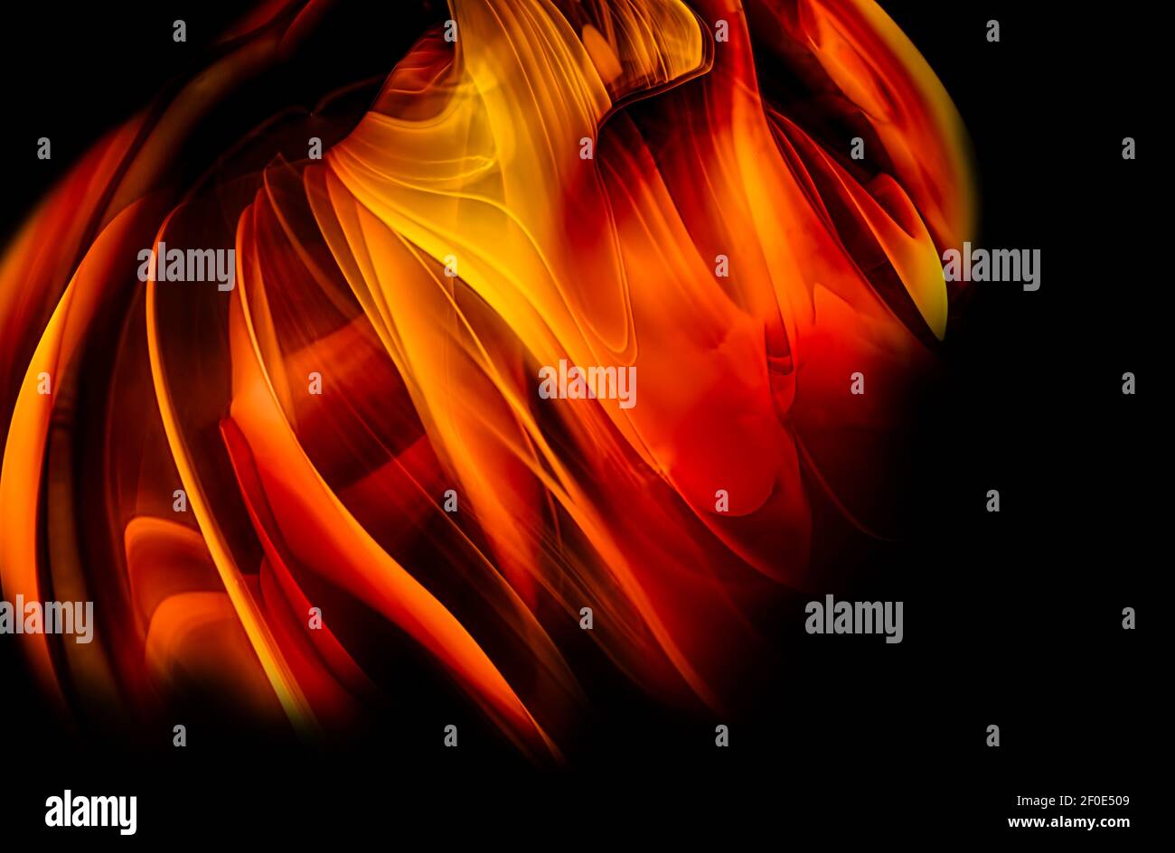 Red and yellow mixed oil paints on black background Stock Photo - Alamy