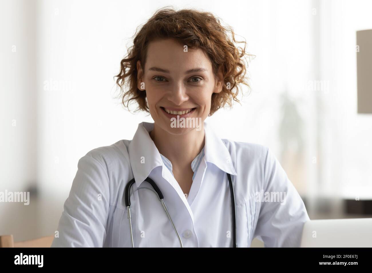 Smiling millennial caucasian doctor hi-res stock photography and images ...
