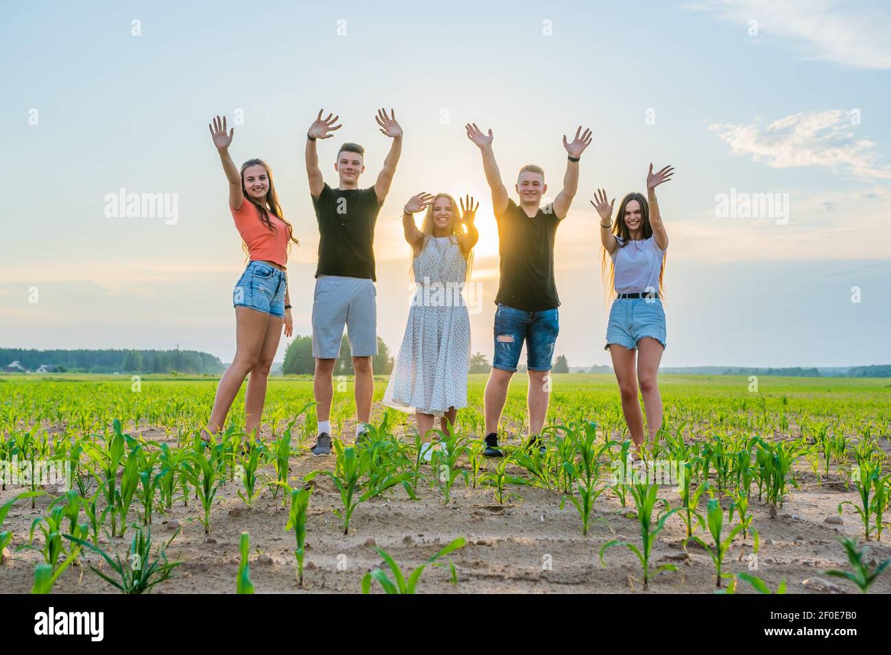 Group cheerful young friends hiking hi-res stock photography and images ...