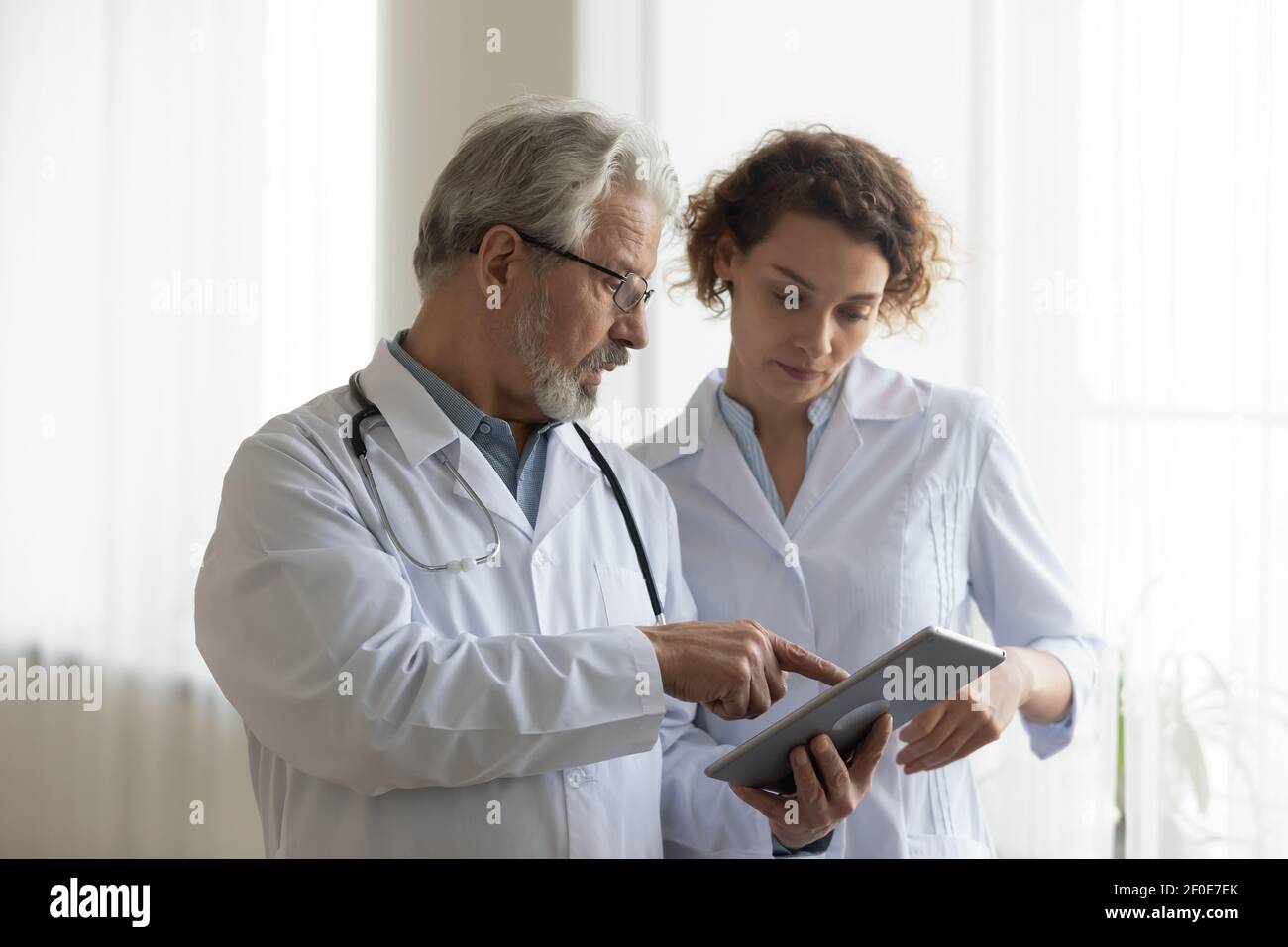 Diverse male healthcare worker hi-res stock photography and images - Alamy
