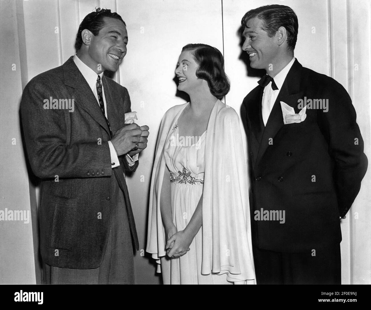 Heavyweight Boxer MAX BAER visiting MYRNA LOY and CLARK GABLE on set
