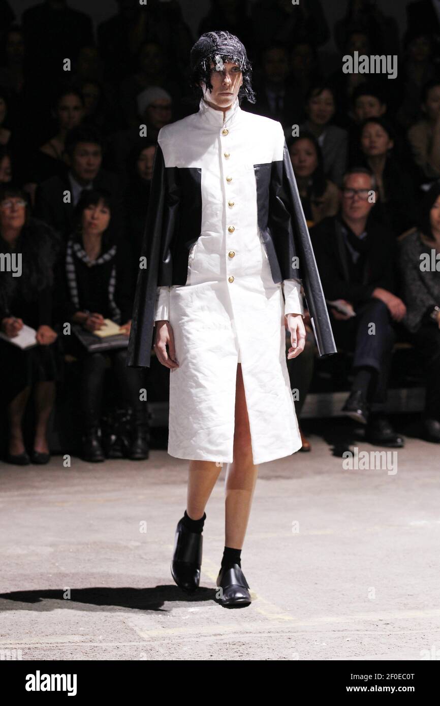 Models walk on the runway during the Comme de Garcon Spring Summer 2011 Fashion Show in Paris