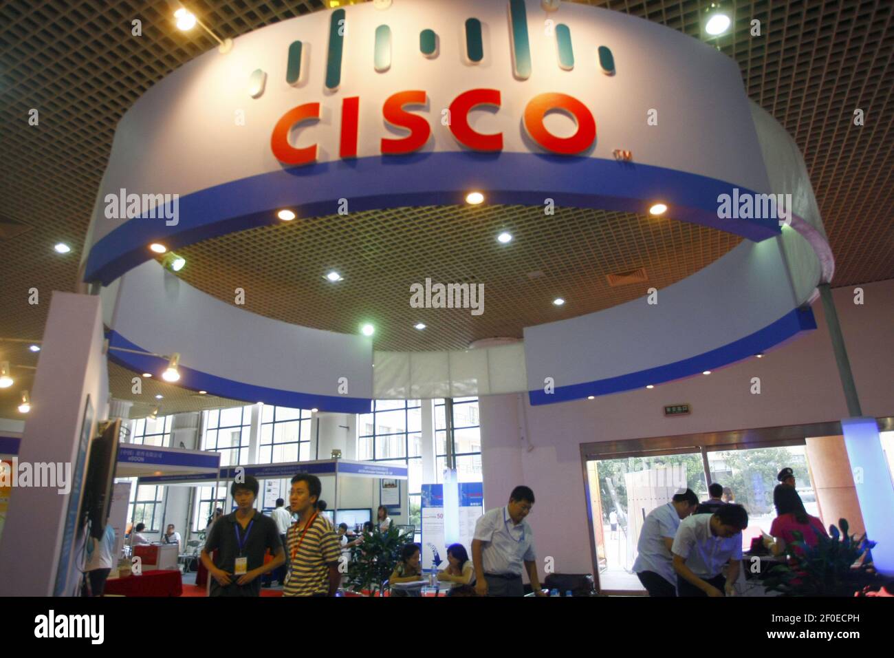 --FILE--People visit the stand of US technology conglomerate Cisco during an expo in Shanghai, China, 15 September 2010. Finnish telecom giant Nokia and US technology conglomerate Cisco denied reports of significant layoffs in China when contacted by the Global Times on Thursday (1 August 2019). (Photo by Weng lei - Imaginechina/Sipa USA) Stock Photo