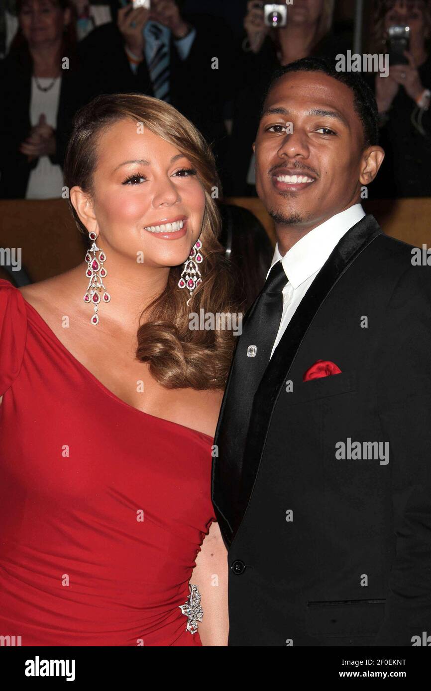 23 January 2010- Los Angeles, California- Singers Mariah Carey and Nick ...
