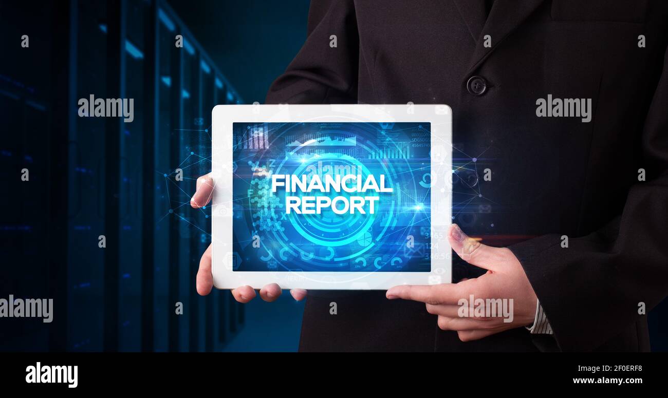 Young business person working on tablet and shows the inscription ...