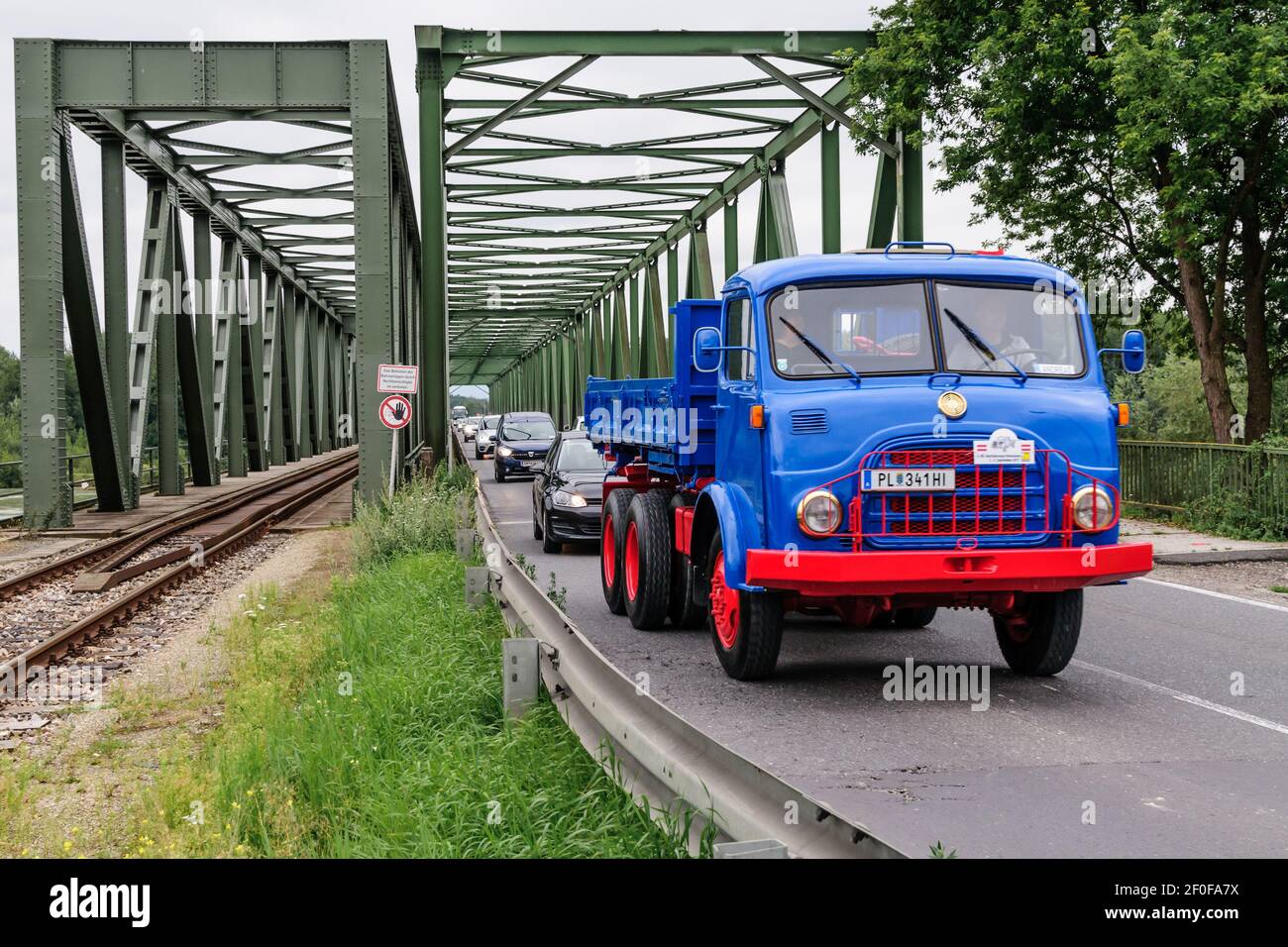 mauthausen, austria, 01 sep 2017, steyr vintage truck crossing the danube bridge in mauthausen at the oldtimer truck meeting, meeting for vintage truc Stock Photo