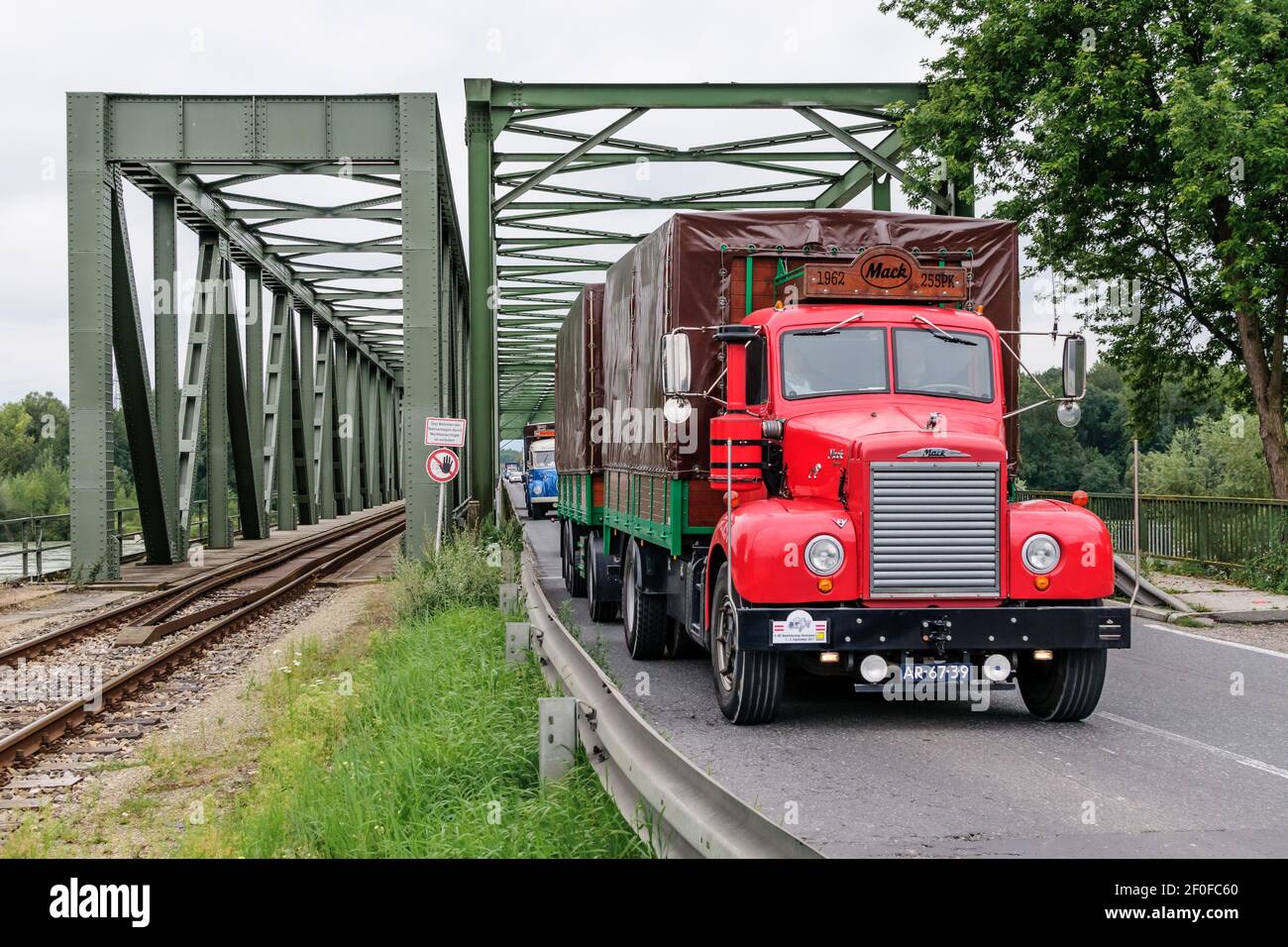 mauthausen, austria, 01 sep 2017, vintage mack truck crossing the danube bridge in mauthausen at the oldtimer truck meeting, meeting for vintage truck Stock Photo