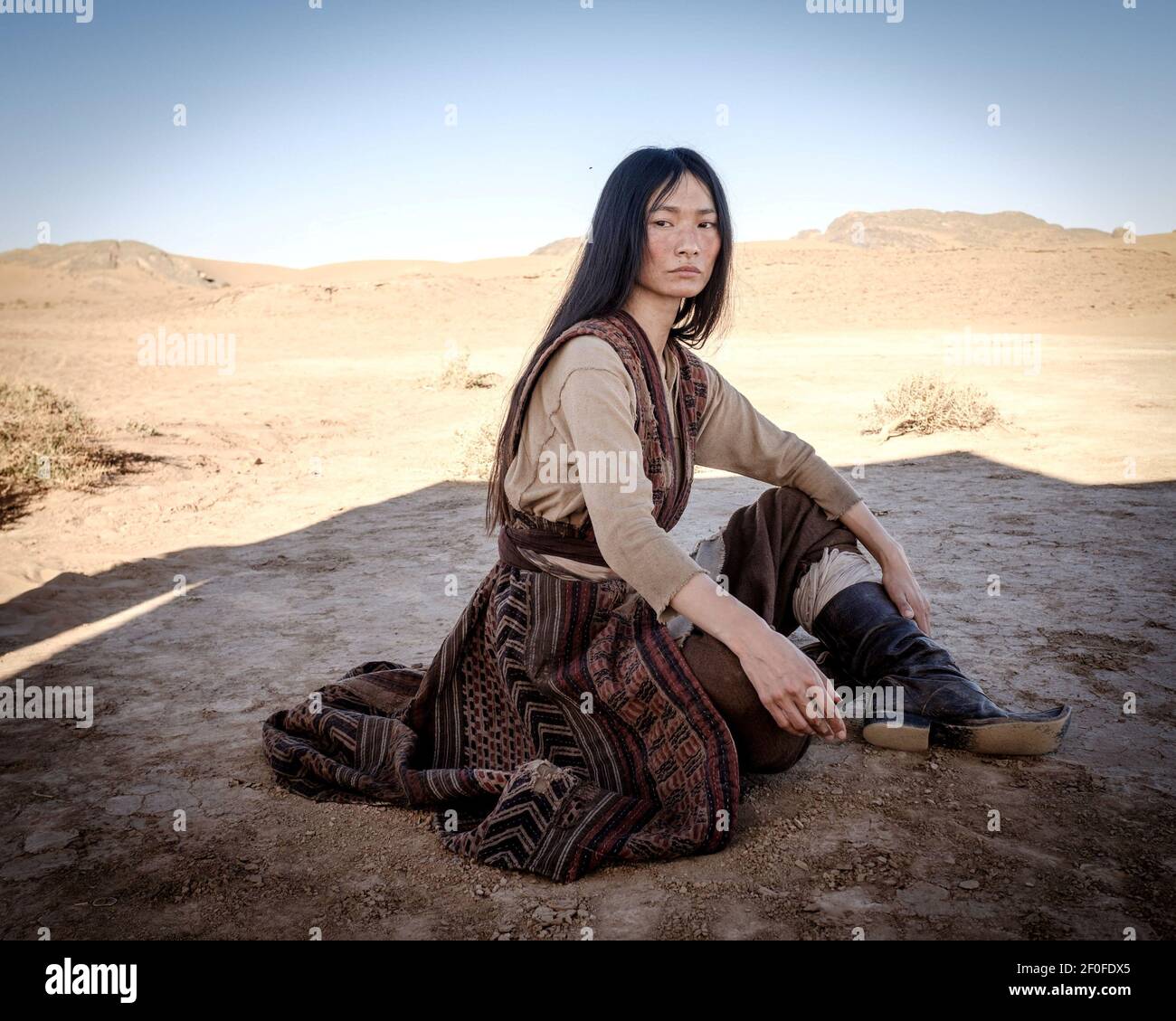 GANA BAYARSAIKHAN in WAITING FOR THE BARBARIANS (2019), directed by CIRO GUERRA. Credit: Iervolino Entertainment / Ithaca Pictures / Album Stock Photo