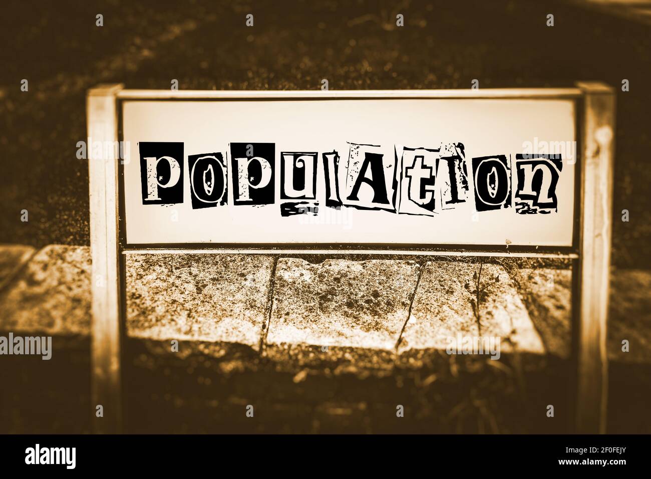 Population written on a street sign in ransom note typography in a sepia tone Stock Photo