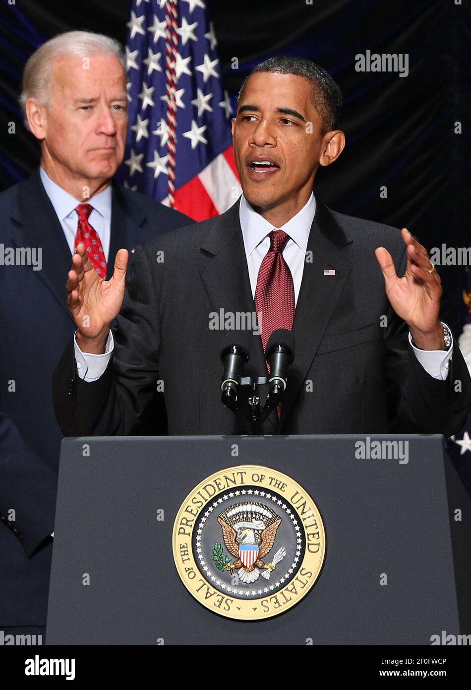 21 July 2010 - Washington, D.C. - U.S. President Barack Obama speaks as Vice President Joe Biden looks on before signing the Dodd-Frank Wall Street Reform and Consumer Protection Act at the Ronald Reagan Building July 21, 2010 in Washington, DC. The bill is the strongest financial reform legislation since the Great Depression and also creates a consumer protection bureau that oversees banks on mortgage lending and credit card practices. Photo Credit: Win McNamee/Pool/Sipa Press/1007211947 Stock Photo