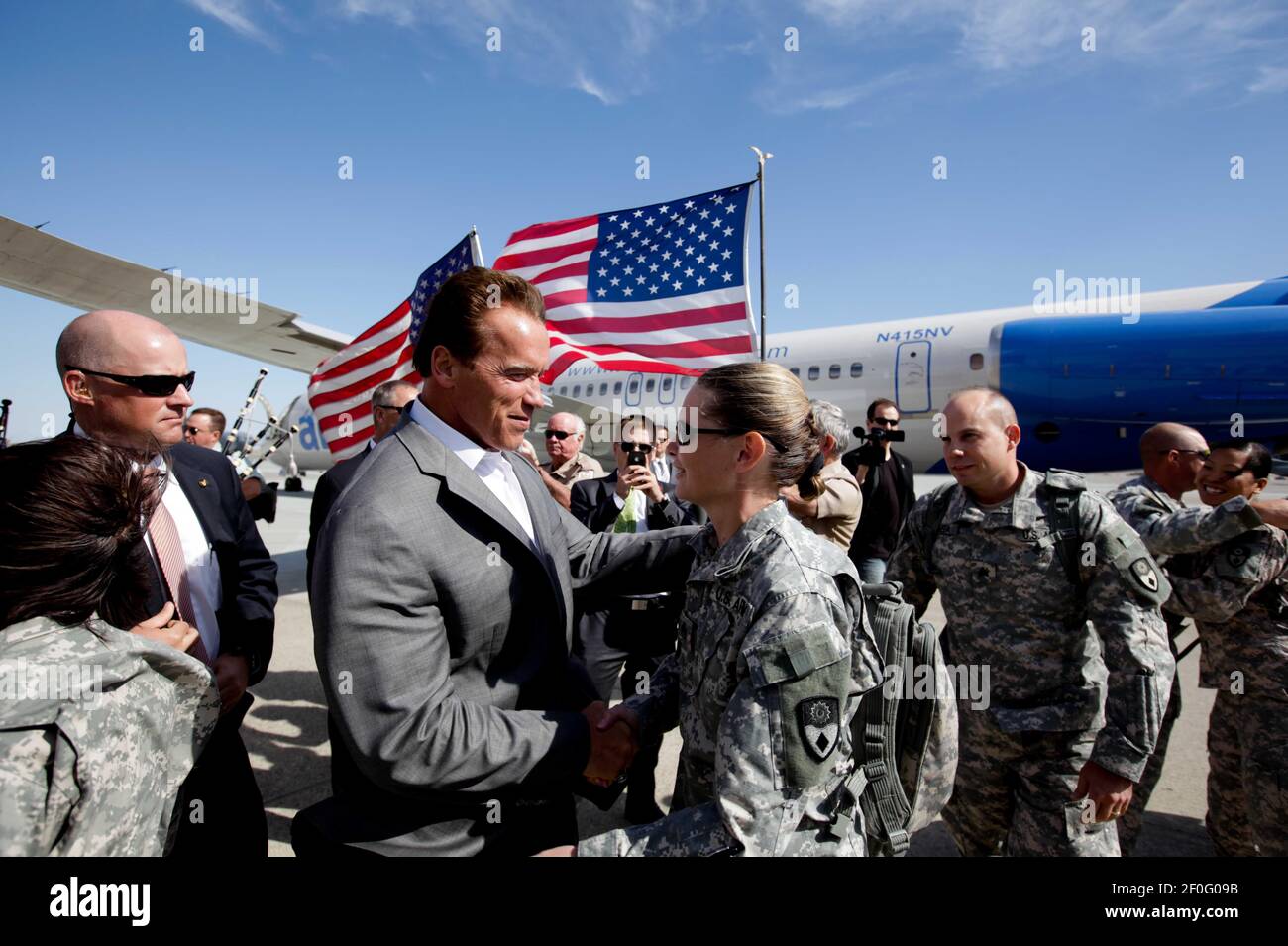 10 August 2010 - Fairfield, California - Governor Arnold Schwarzenegger welcomed home nearly 100 California National Guard soldiers from the GuardÃ•s 49th Military Police Brigade as they returned from their one-year deployment in support of Operation Iraqi Freedom. In November 2009, the Governor visited with U.S. military troops, including these guardsmen, at Camp Victory in Baghdad, Iraq to thank them for their service to our nation. The following photos were taken at Travis Air Force Base in Fairfield, California. Photo Credit: Justin Short/Office of Gov. Schwarzenegger/Sipa Press/1008111932 Stock Photo