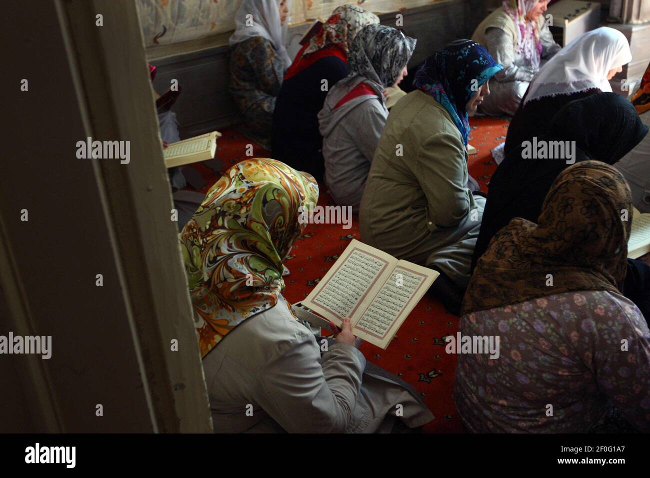 20 August 2010 Istanbul, Turkey Muslim worshipers are seen to read