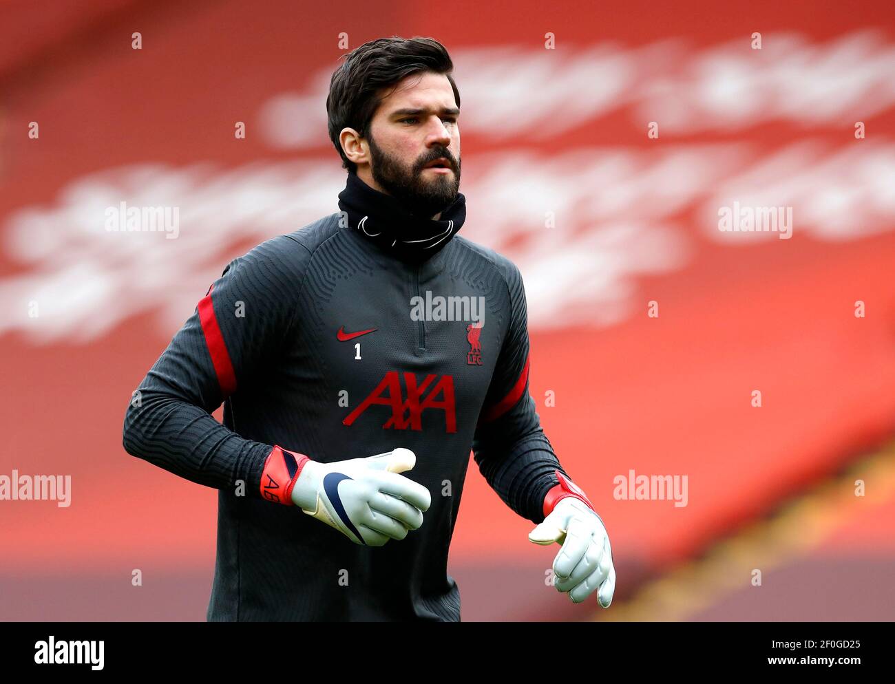 Liverpool goalkeeper Alisson warming up before the Premier League match ...