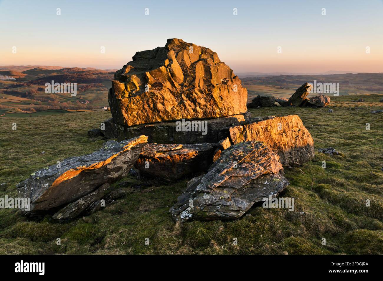 Sunset at The Norber Stones, Austwick, Yorkshire Dales National Park, UK. The stones are glacial erratic boulders. Stock Photo
