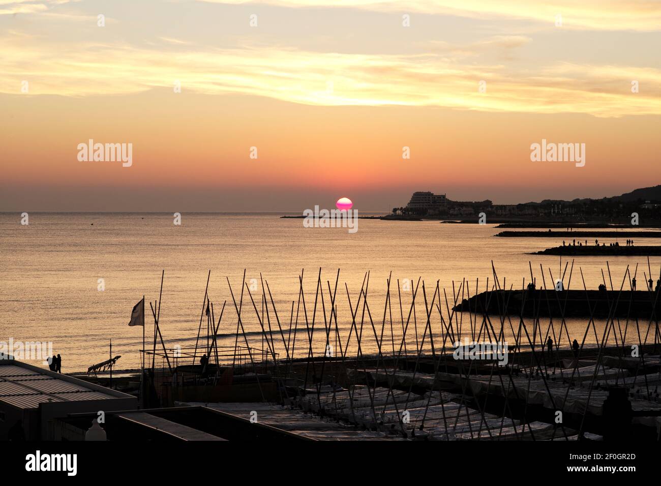 Beautiful sunset and silhouette of Sitges Spain Stock Photo