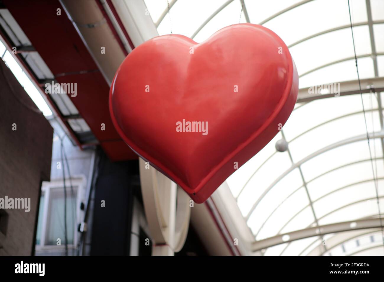 Red heart sculpture filled with love Stock Photo - Alamy