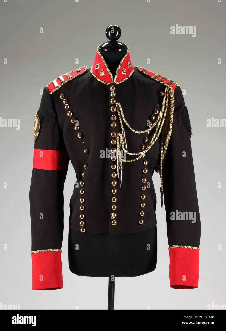 10 November 2010 - New York, NY - A Michael Jackson black jacket made by  Tompkins and Bush with red collar, epaulettes, armband and cuffs. Gold  accents throughout including braiding, three lines