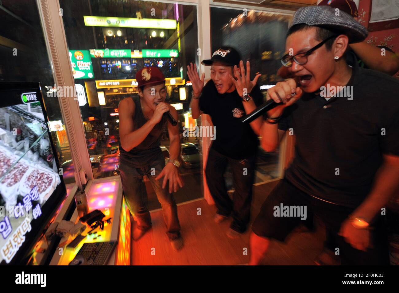 27 August 2010 - Seoul, South Korea - Young men sing a song at 