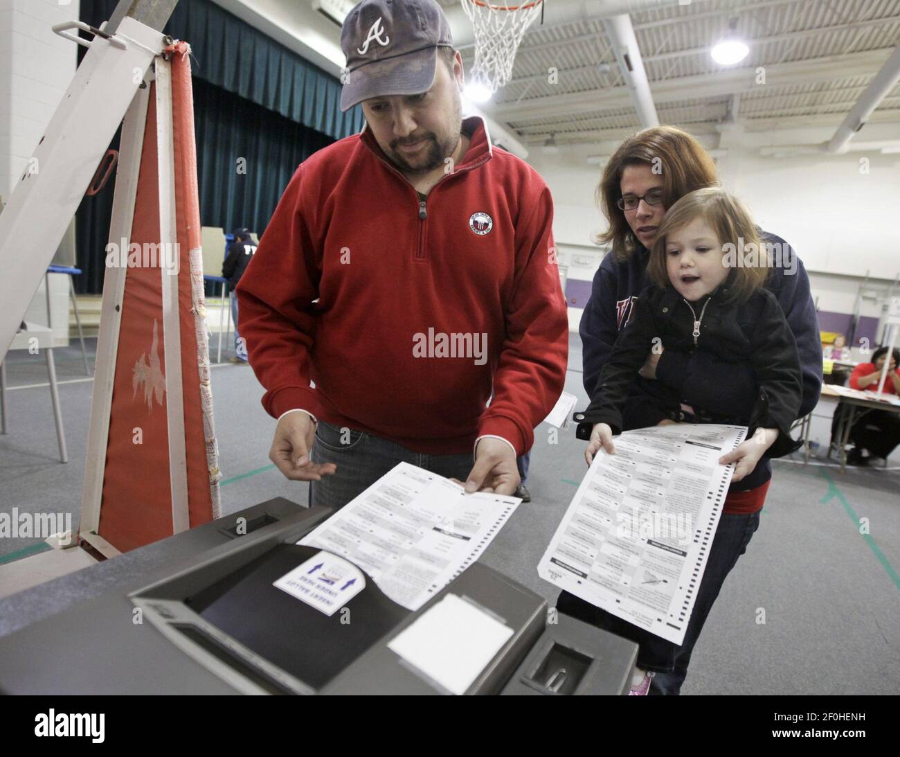 Bryan and Laura Boyd and their daughter AbbyKate Boyd, 3, cast their