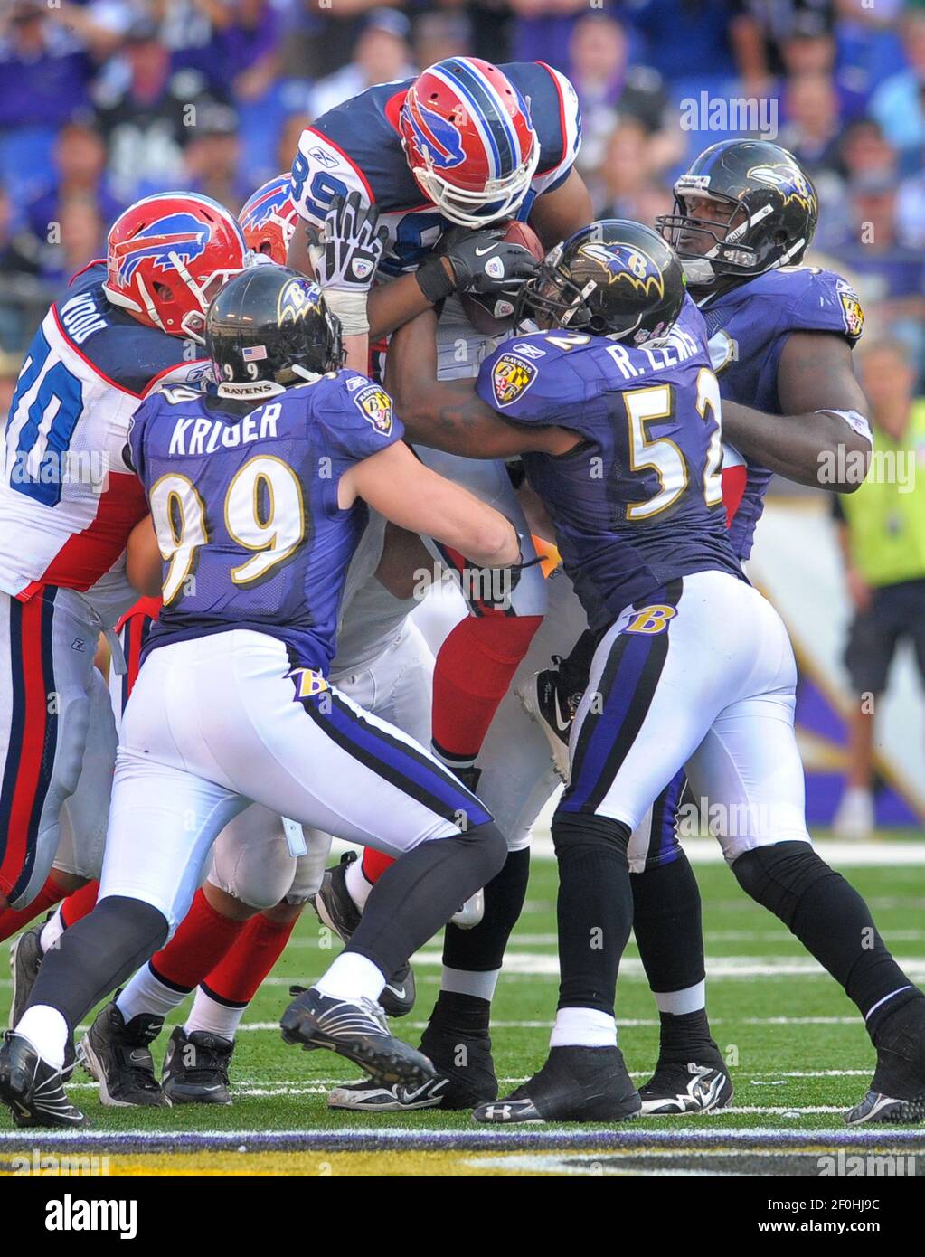 Buffalo Bills tight end Shawn Nelson is lifted off the ground by the