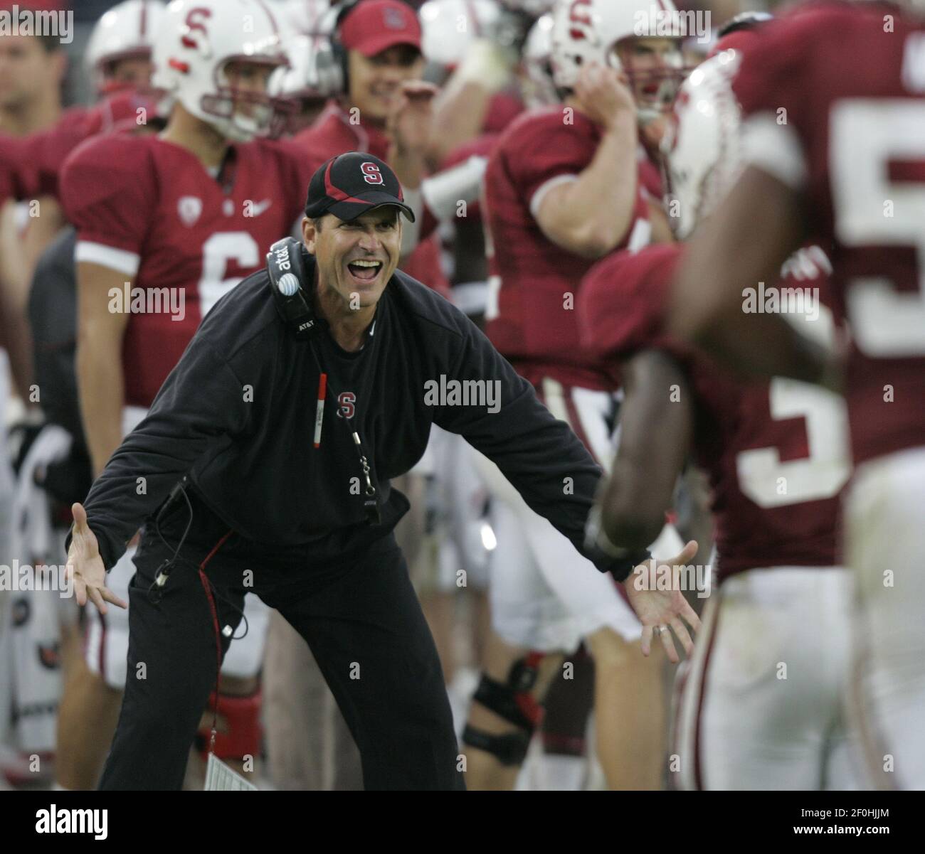 Stanford head coach Jim Harbaugh greets Doug Baldwin after Baldwin's  touchdown reception in the third quarter against Washington State at Stanford  University in Stanford, California, on Saturday, October 23, 2010. Stanford  beat