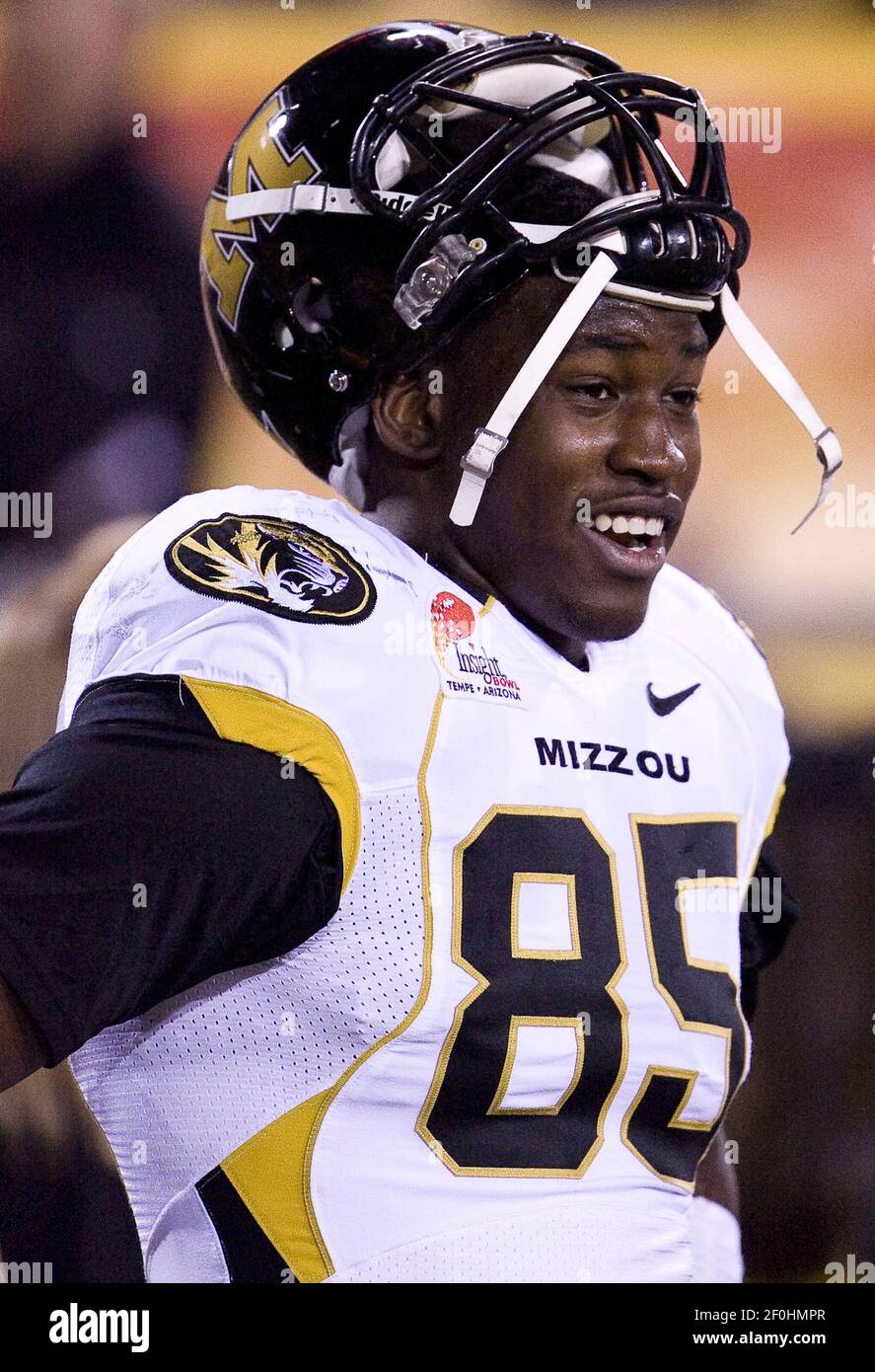 Missouri Tigers defensive end Aldon Smith (85) jokes with a teammate before the start of the Tigers' game against the University of Iowa in the Insight Bowl at Sun Devil Stadium in Missouri Tigers defensive end Aldon Smith (85) jokes with a teammate before the start of the Tigers' game against the University of Iowa in the Insight Bowl at Sun Devil Stadium in
