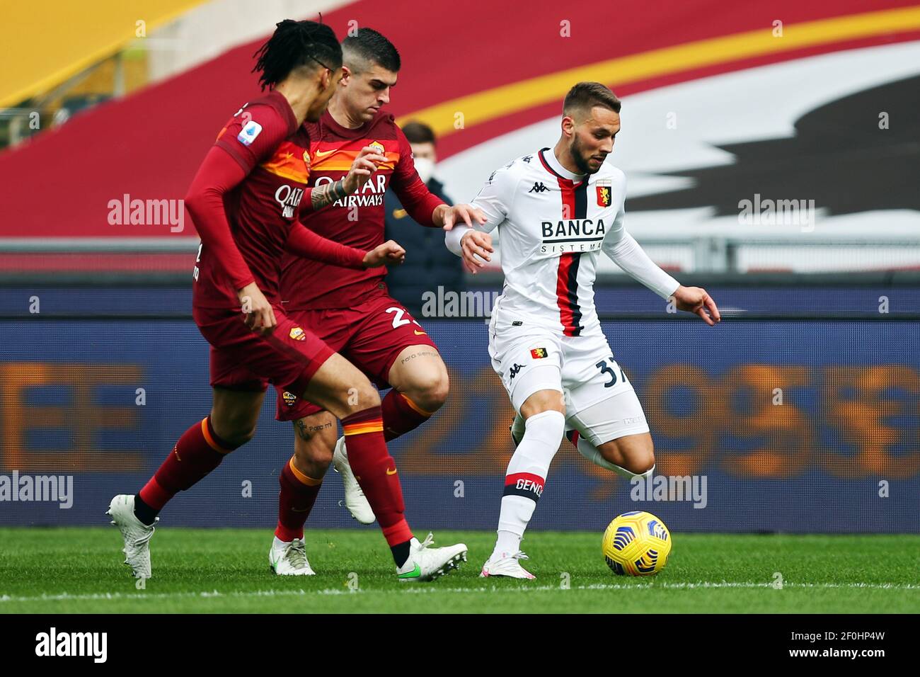 Marko Pjaca Of Genoa R Vies For The Ball With Gianluca Mancini C And Chris Smalling L Of Roma During The Italian Championship Serie A Football Match Between As Roma And Genoa
