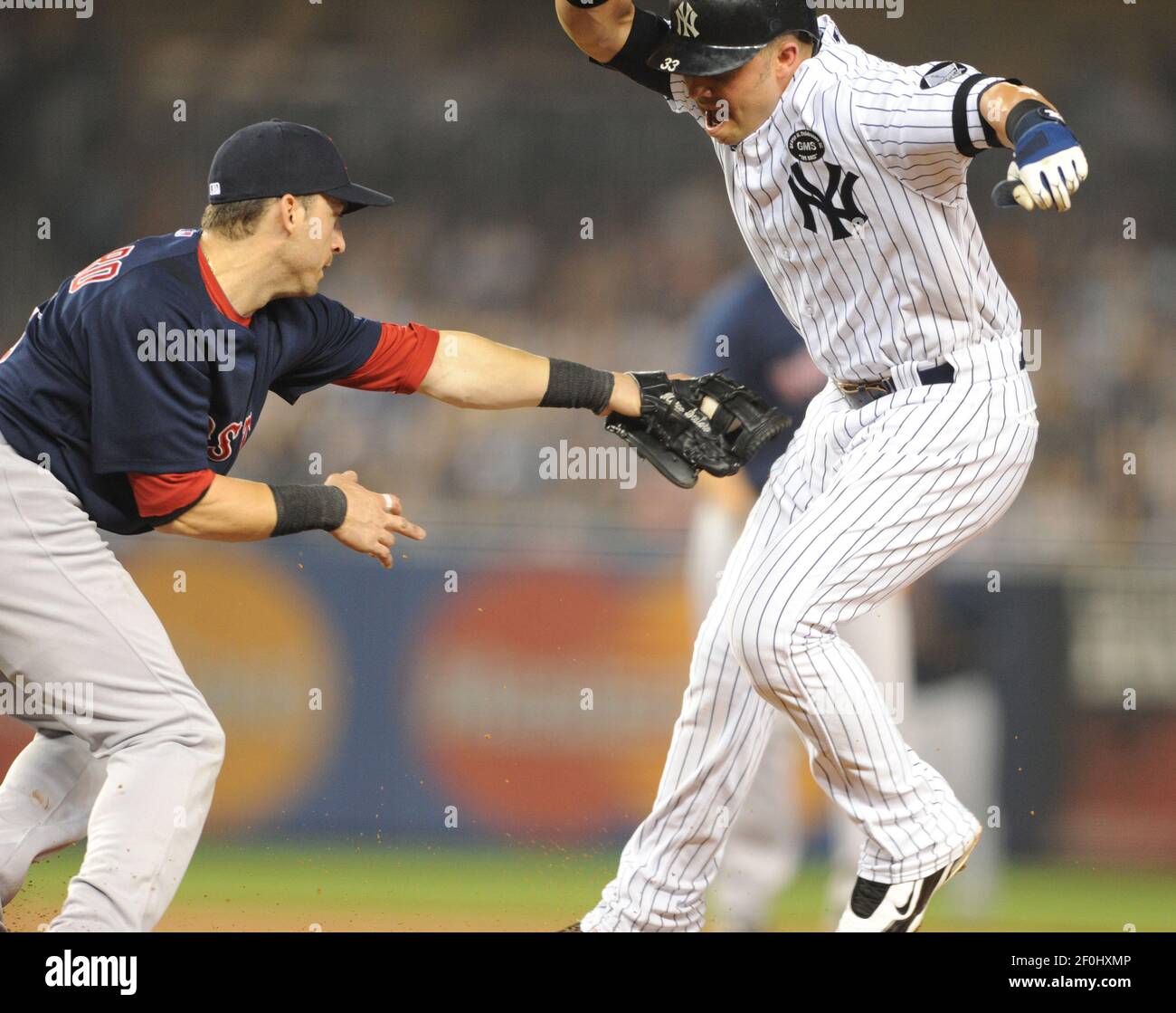 Boston Red Sox infielder Kevin Youkilis is pictured during spring training  baseball in Fort Myers, Fla., Thursday, Feb. 17, 2011. (AP Photo/Dave  Martin Stock Photo - Alamy