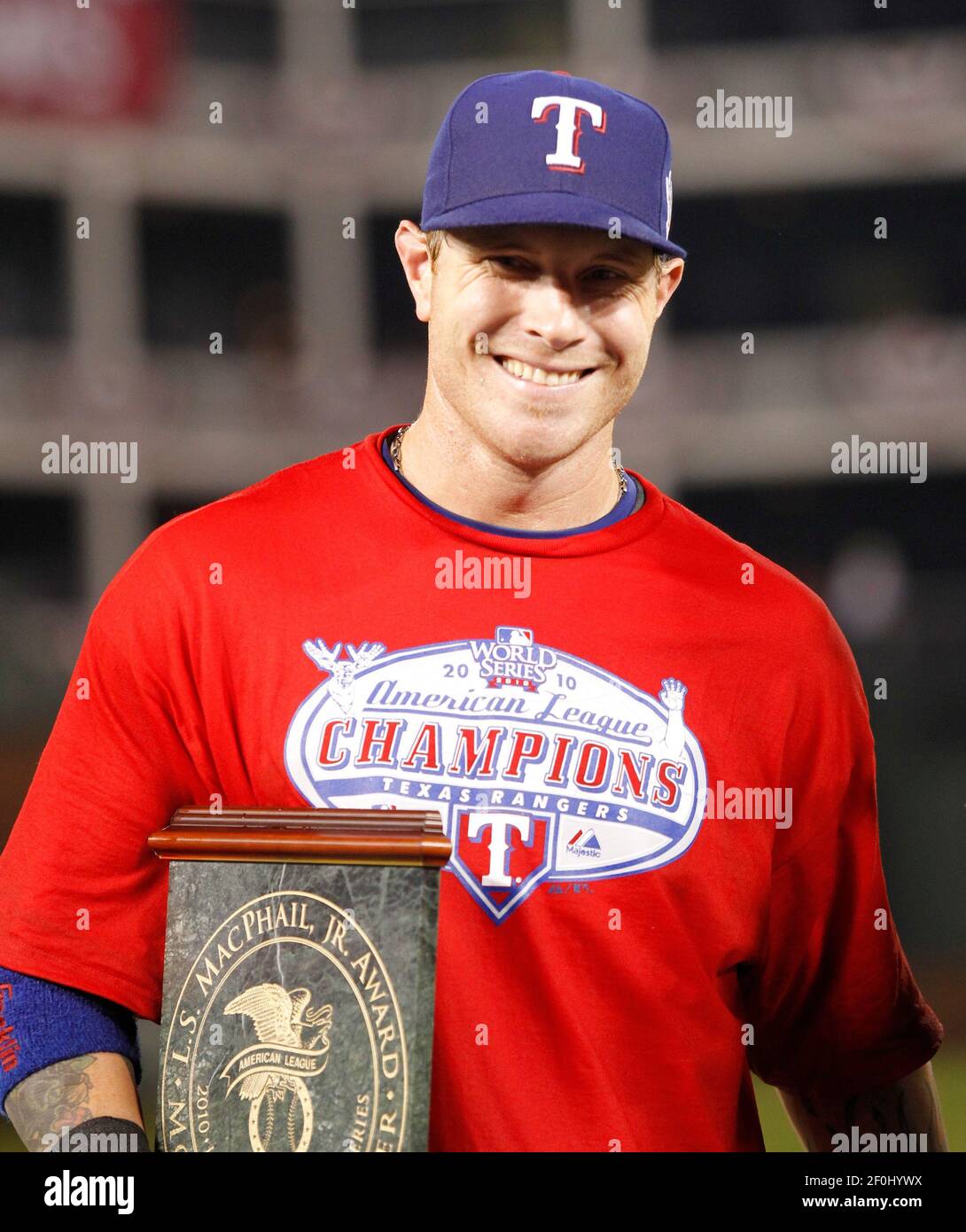 Texas Rangers left fielder Josh Hamilton receives the series MVP award  after defeating the New York Yankees in the American League Championship  Series in six games at the Rangers Ballpark in Arlington