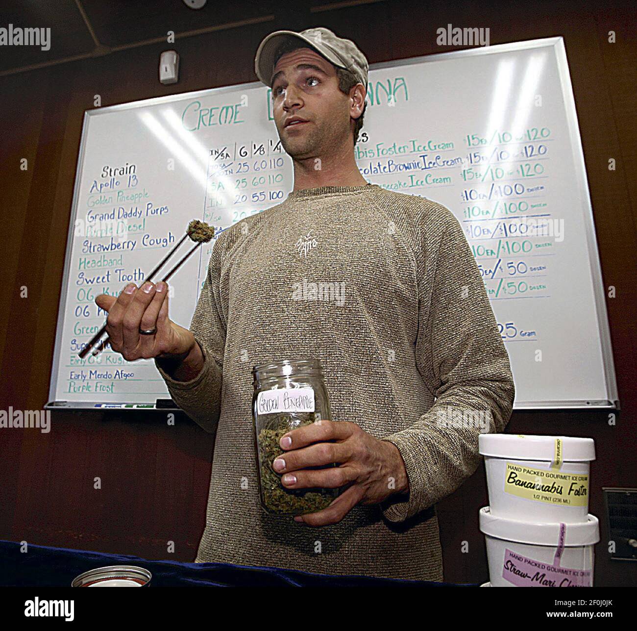 Jonathan Kolodinski behind the counter at his new Creme De Canna