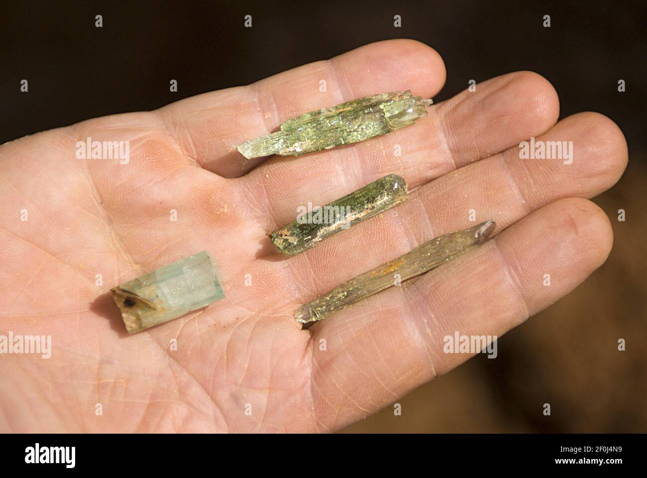 Miner Terry Ledford holds emeralds of poor quality, but good size