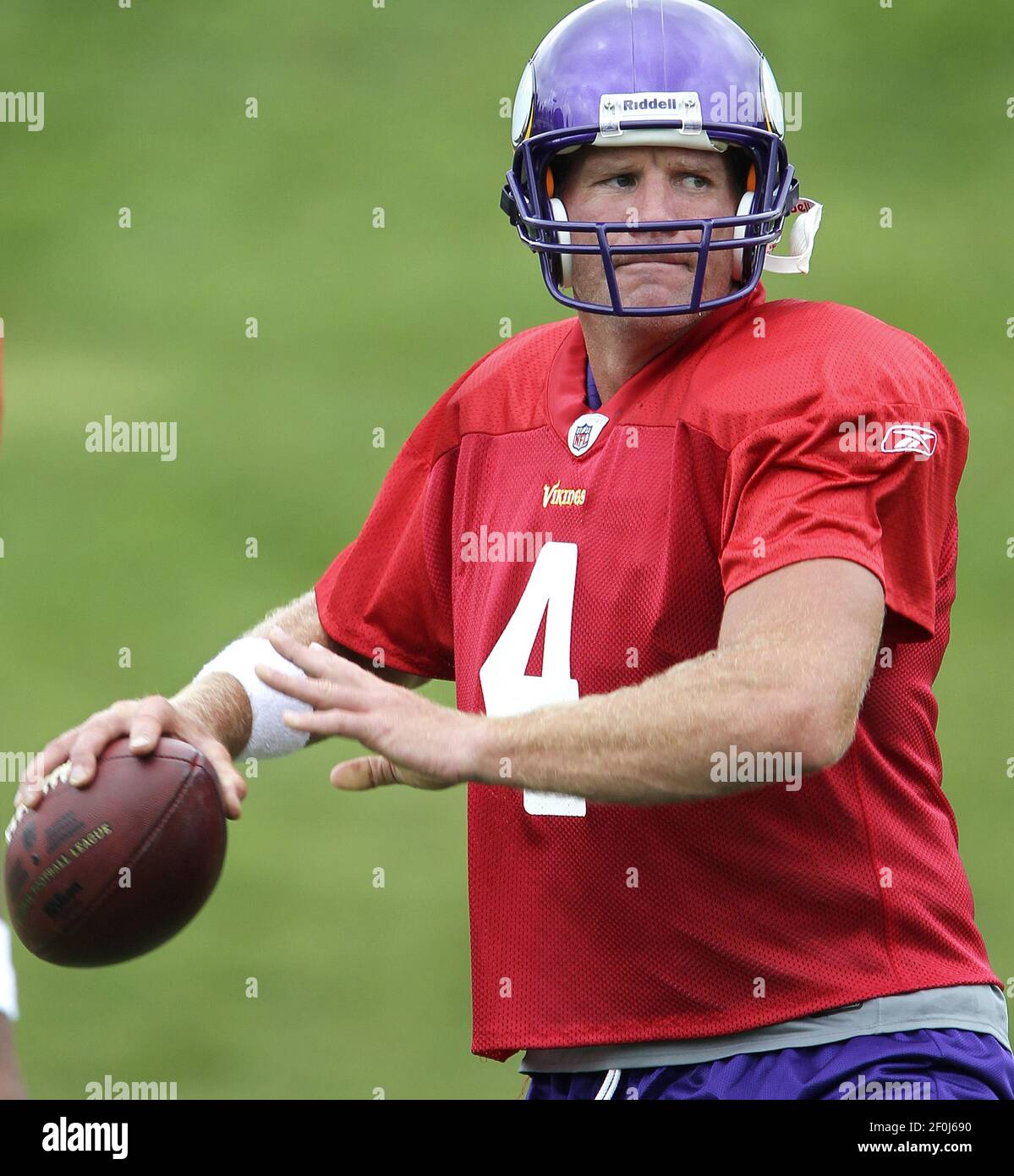 Brett Favre of the Minnesota Vikings looks to pass during practice at Winter Park in Eden