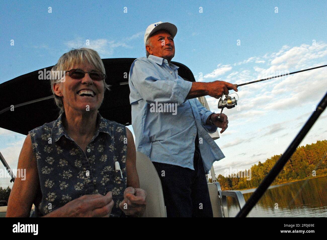 Pat Smith and Norb Berg fished for northerns, bass and panfish on Bud Grant&apos;s property in northwest Wisconsin. (Photo by Dennis Anderson/Minneapolis Star Tribune/MCT/Sipa USA) Stock Photo
