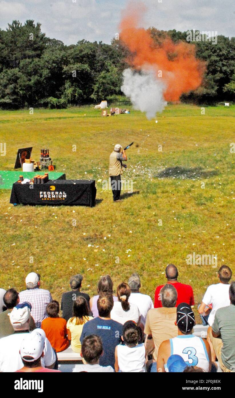 Trick shooter and TV host Tom Knapp performs at Game Fair in Anoka