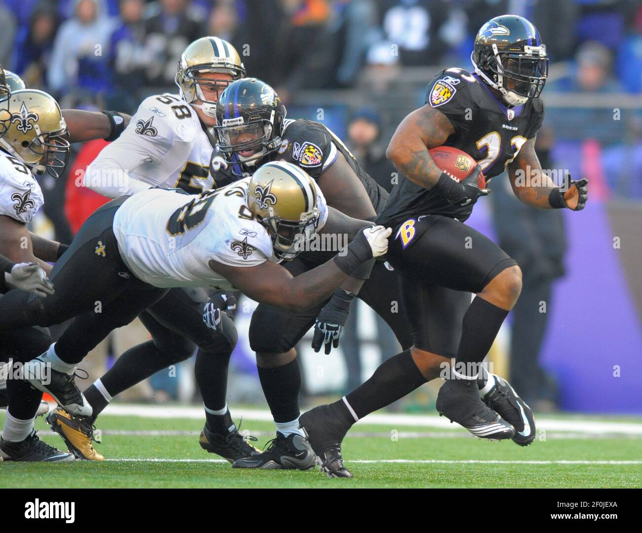 Baltimore Ravens running back Willis McGahee leaves New Orleans Saints defensive tackle Sedrick Ellis with just his shirt tail as he breaks away from the defense for a first down. The Baltimore Ravens defeat the New Orleans Saints 30-24 on Sunday, December 19, 2010, at M&amp;T Bank Stadium in Baltimore, Maryland. (Photo by Doug Kapustin/MCT/Sipa USA) Stock Photo