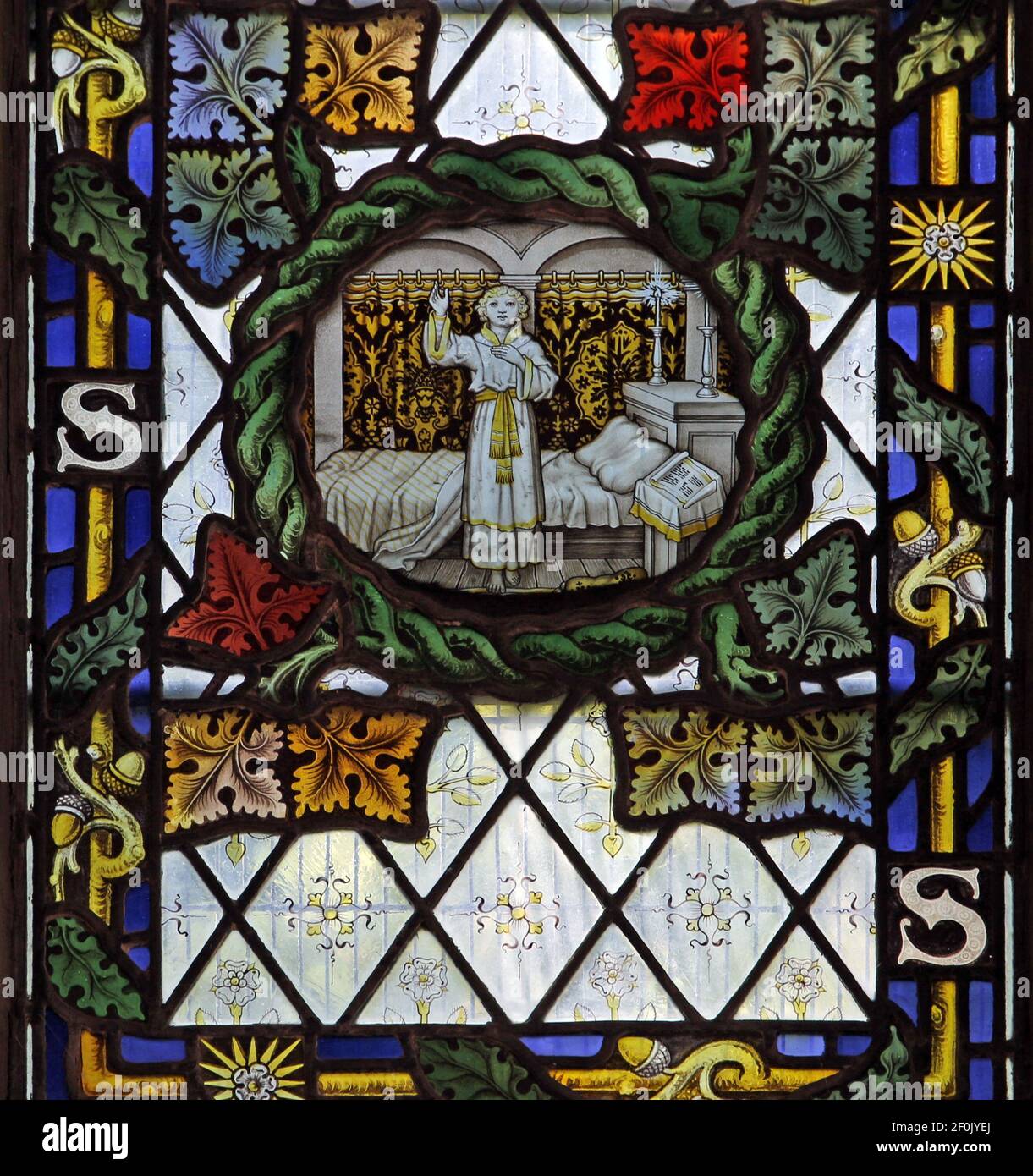 A stained glass window by The Kempe Studios depicting Old Testament Samuel, St Peter's Church, Binton, Warwickshire Stock Photo