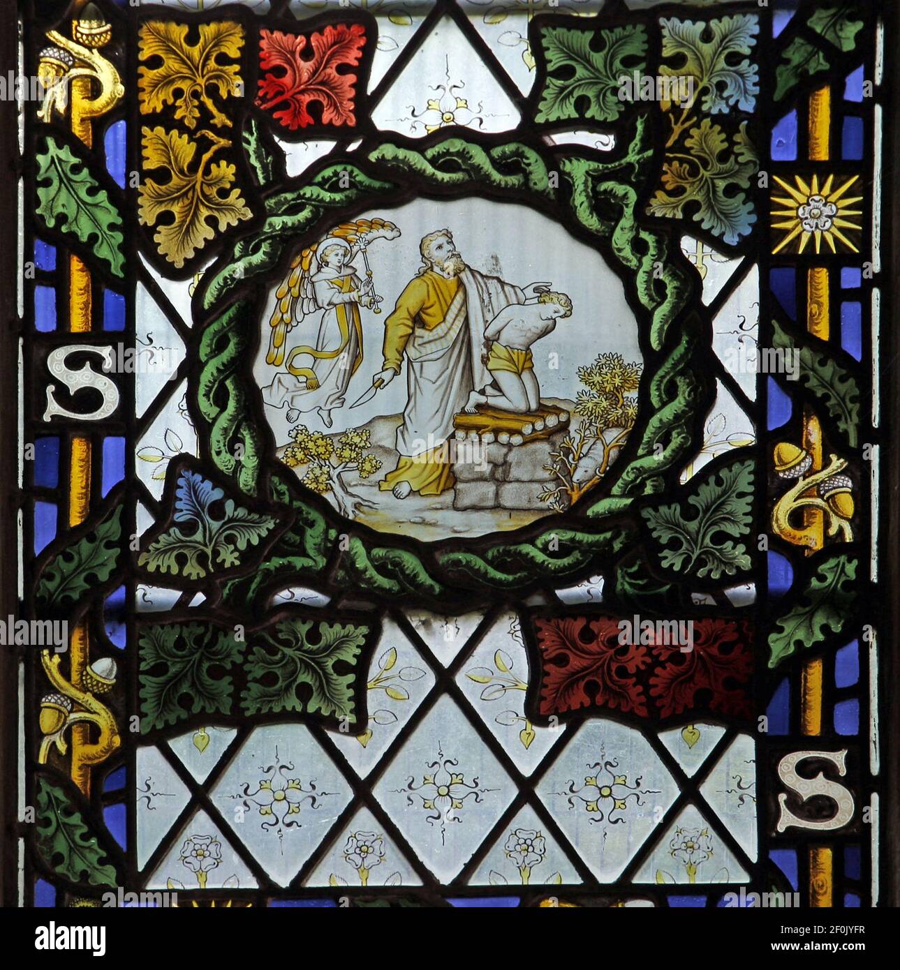 A stained glass window by The Kempe Studios depicting Abraham and Isaac, St Peter's Church, Binton, Warwickshire Stock Photo