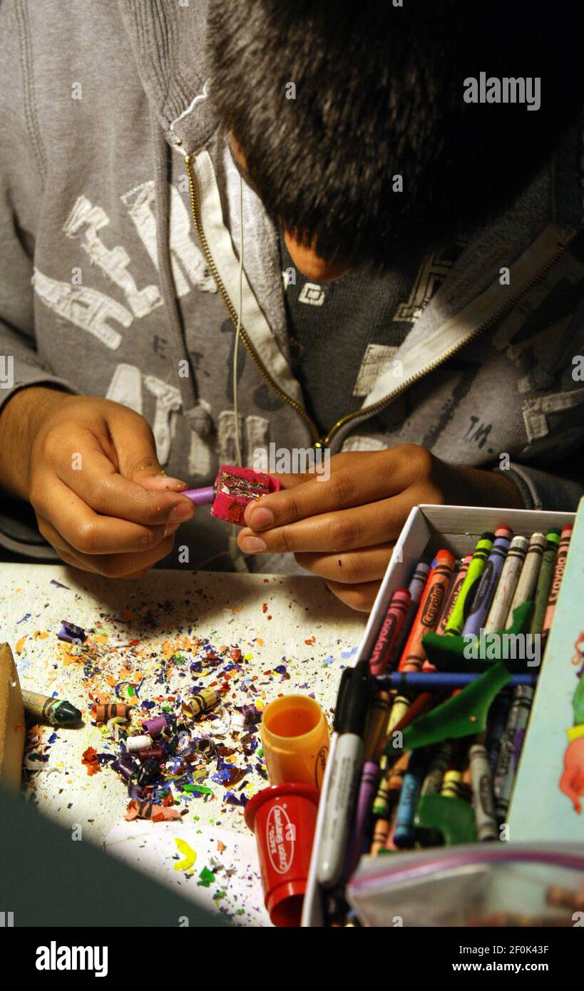 volunteer hannan shaikh sharpens recycled crayons at scarce school and community assistance for recycling and composting a recycling program in glen ellyn illinois march 26 2010 the sharpened and cleaned up crayons will later be placed in a tin box or bag and distributed antonio perezchicago tribunemctsipa usa 2F0K43F