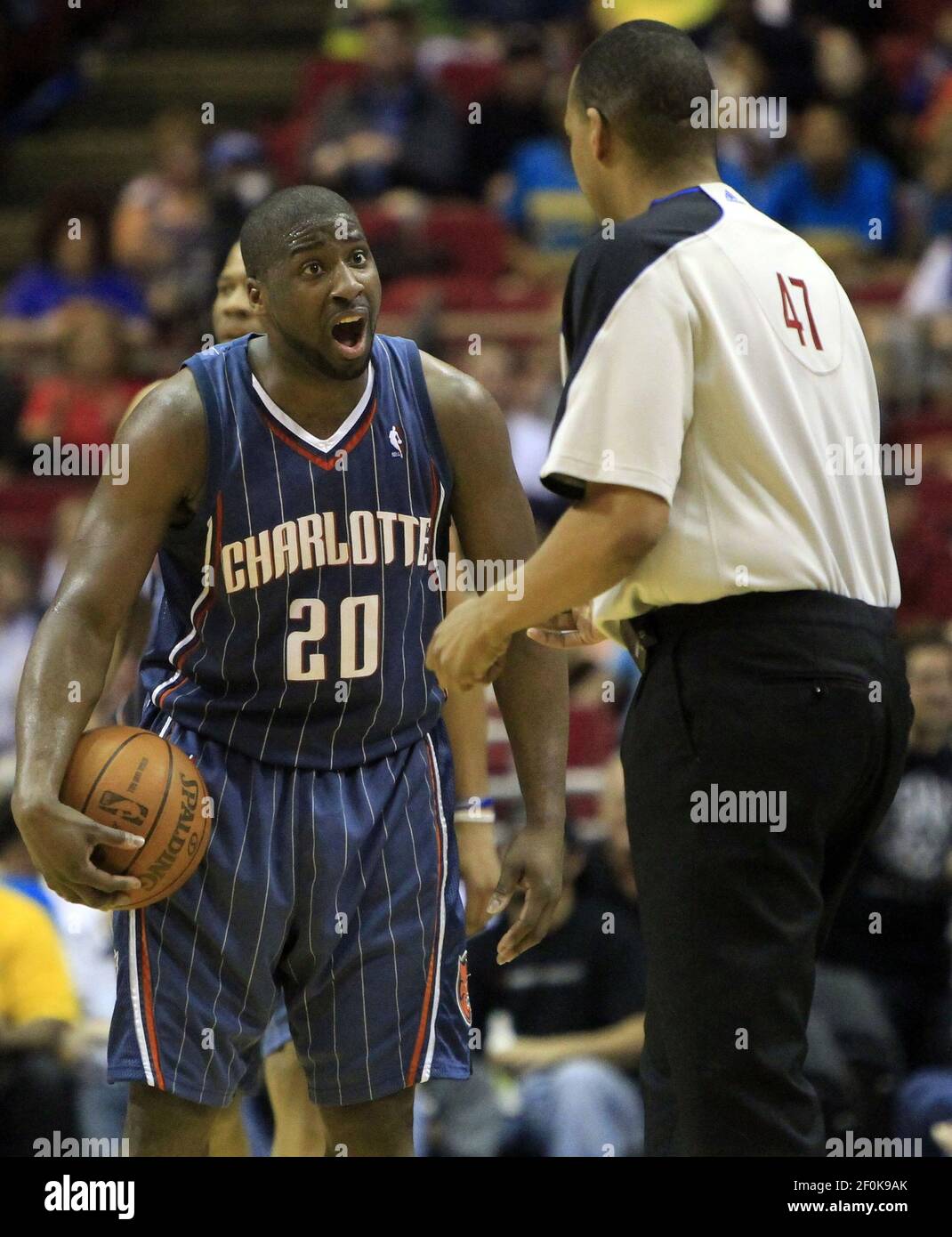 Charlotte Bobcats guard Raymond Felton and head coach Sam Vincent react to  a missed free throw by Emeka Okafor during second half action. The Bobcats  defeated the Bucks 102-99, at Charlotte Bobcats