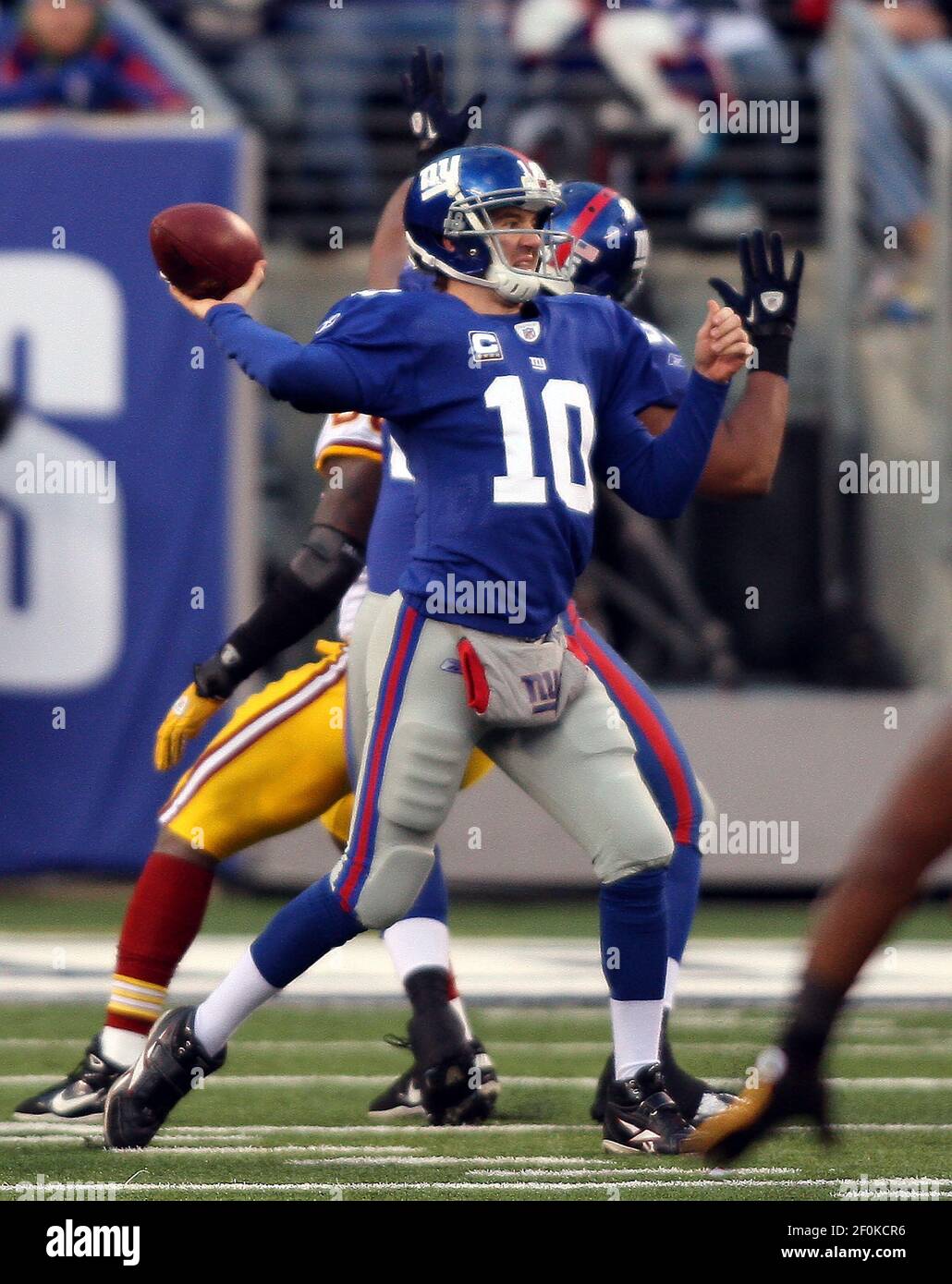 New York Giants quarterback Eli Manning releases a pass in the second  quarter against the Dallas Cowboys at Giants Stadium in East Rutherford,  New Jersey on November 11, 2007. (UPI Photo/John Angelillo