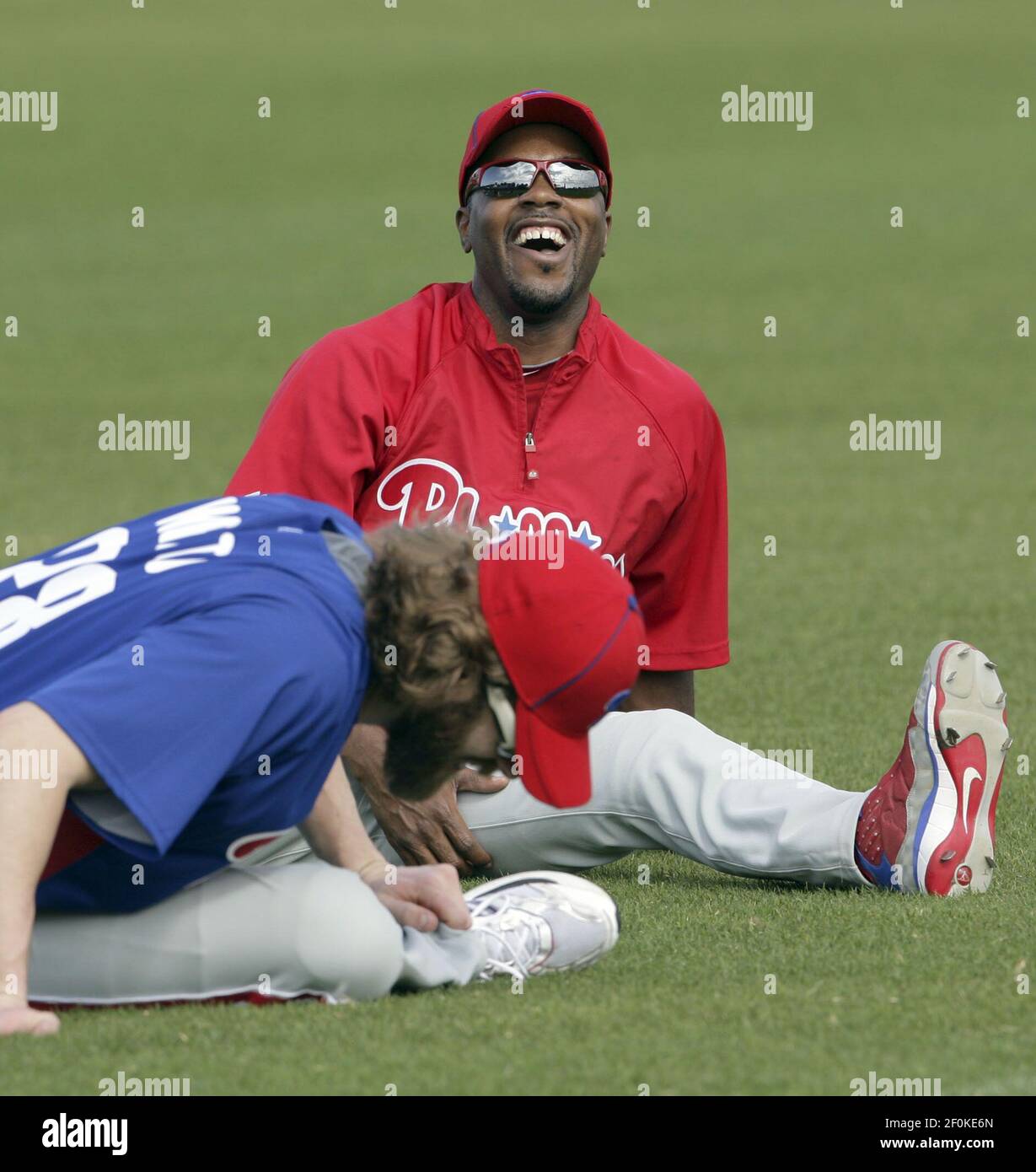 Philadelphia Phillies' Jimmy Rollins, right, laughs while