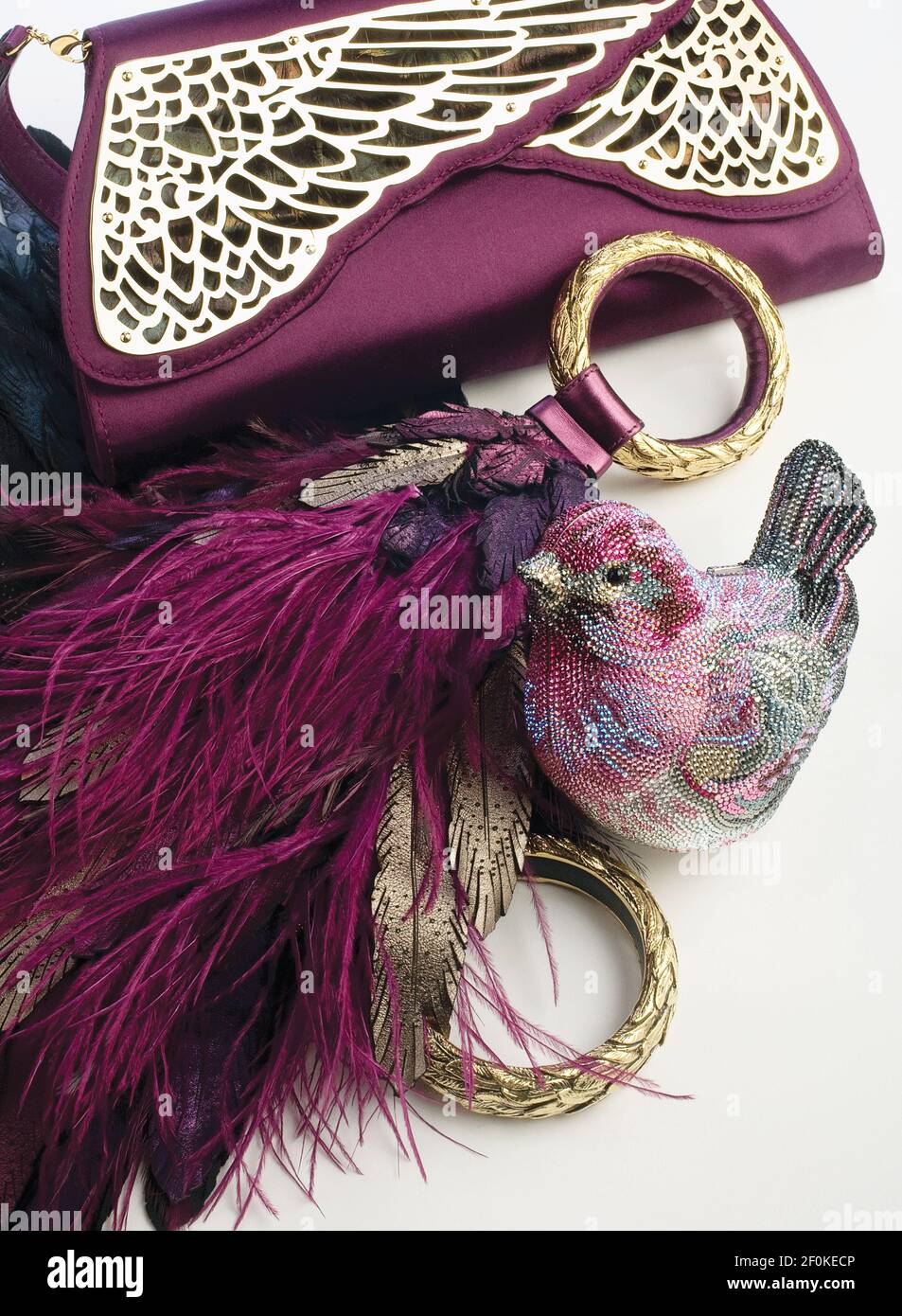From designer Raven Kauffman come two feather and leather bracelet bags  handmade in Italy from her Ale collection Â— ale means "wing" in  Italian Â— ($2,195 each) and a plum-silk couture clutch